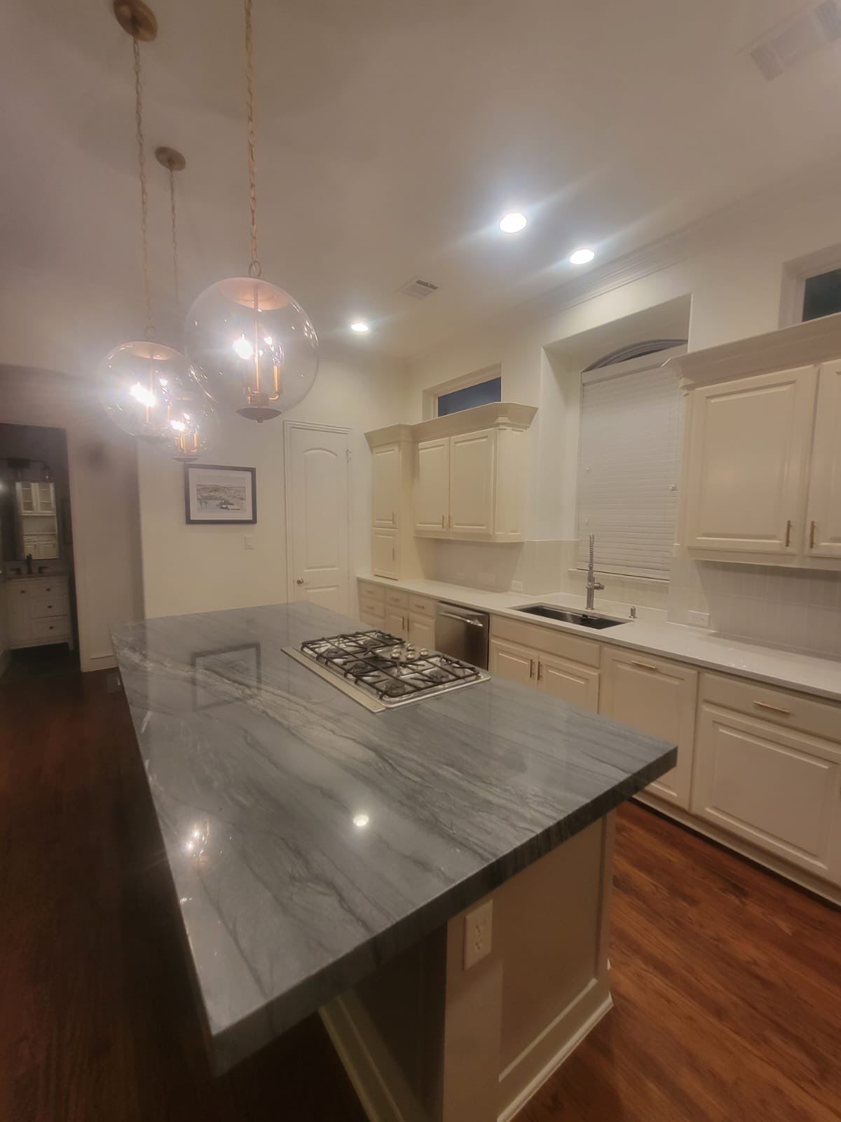 Kitchen Remodel using Quartzite by SLM General Contractors & Roofing