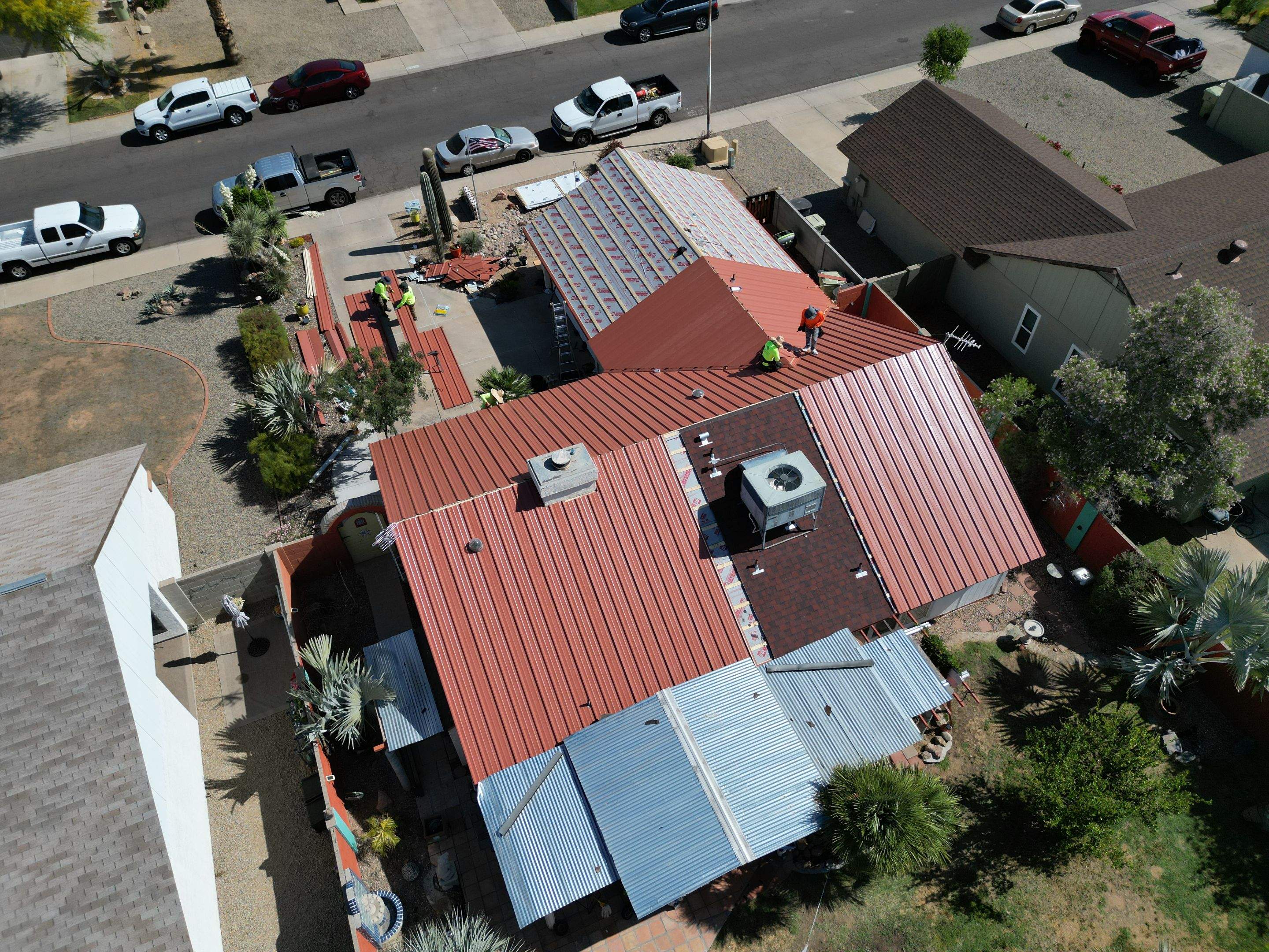 Terra Cotta Exposed Fastener by Reimagine Roofing
