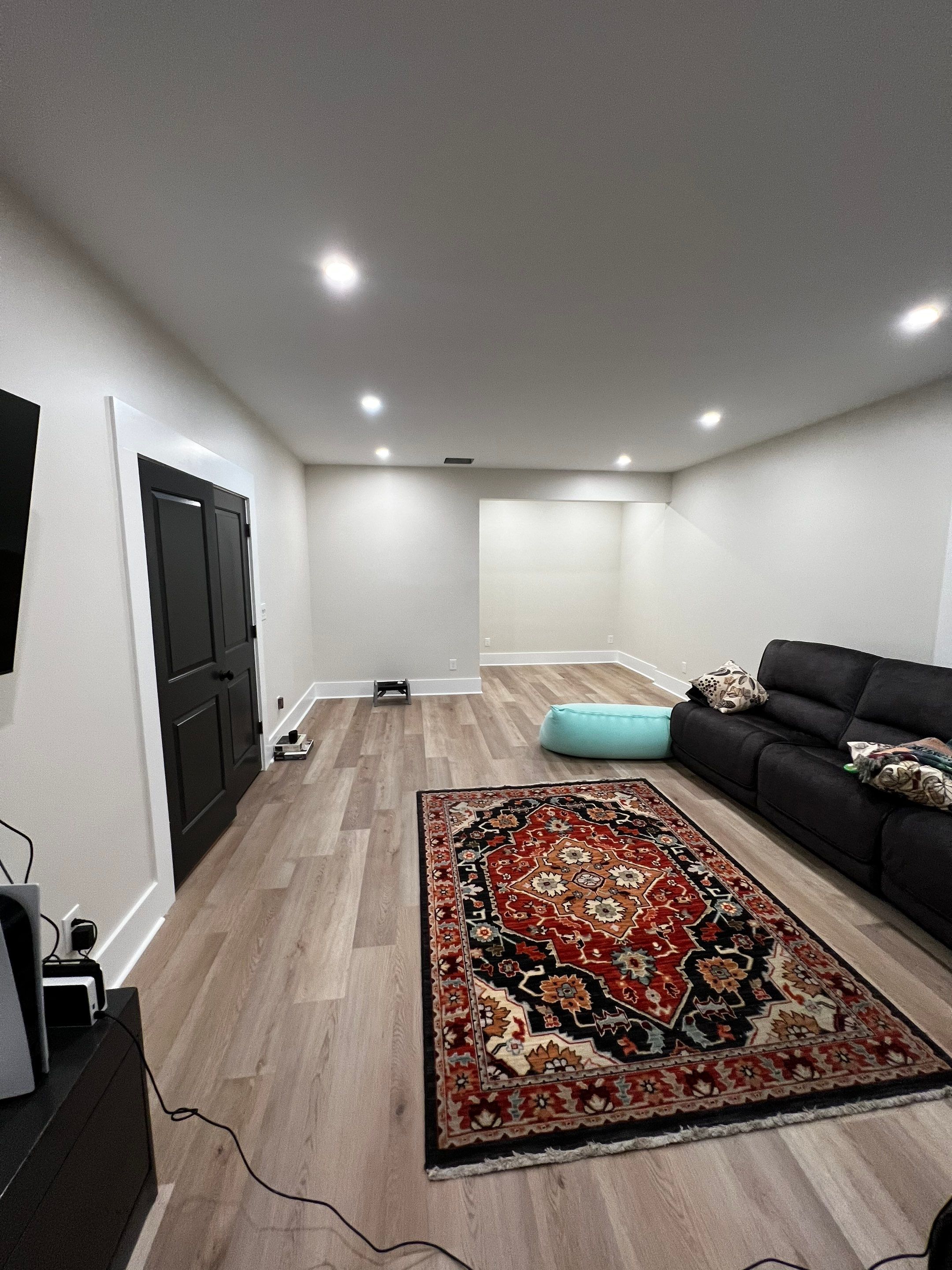 Basement Remodeling With New Bathroom and Luxury Vinyl Flooring by Swift Home Renovations