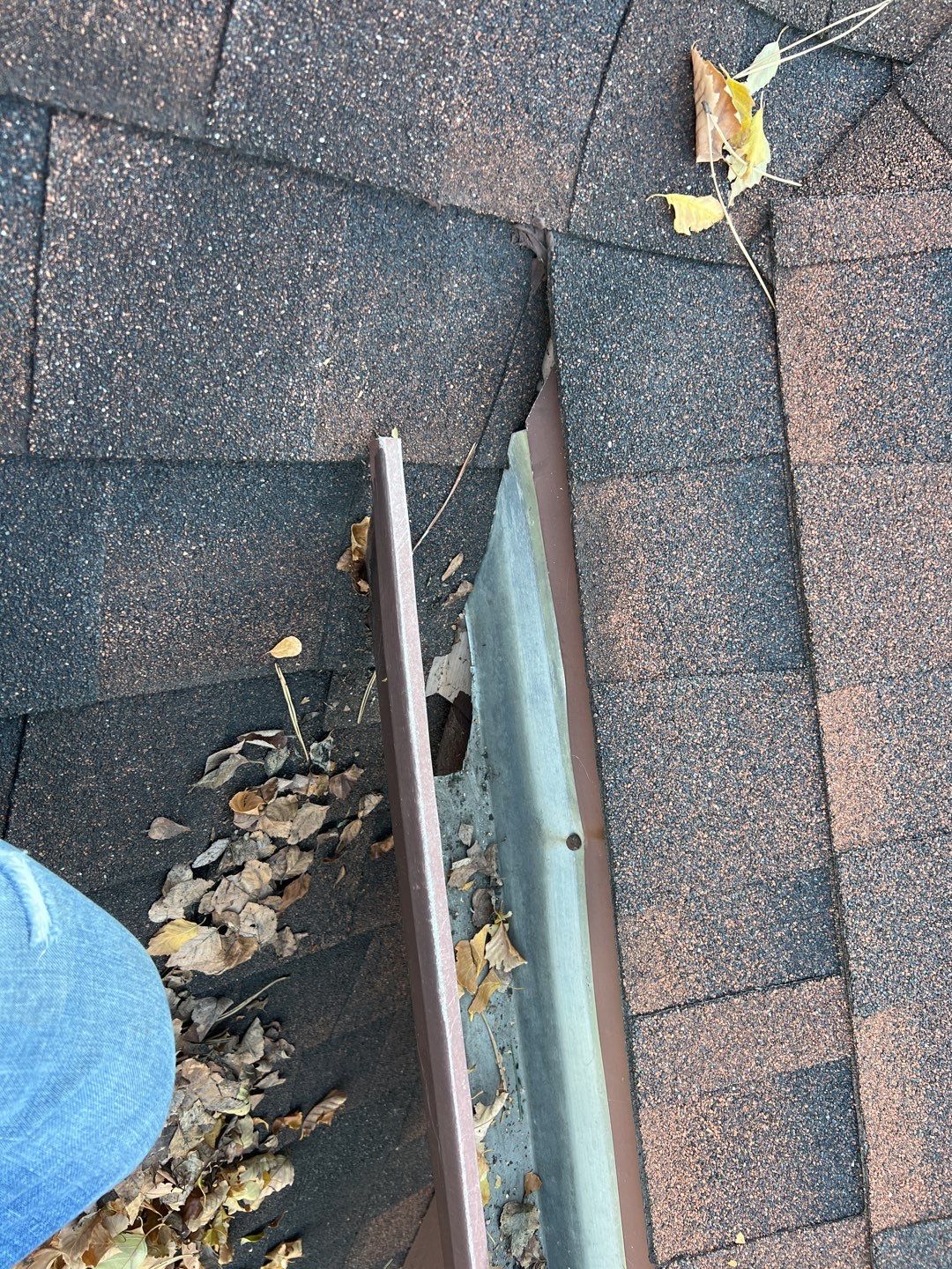 Step flashing repair on roof to wall by Pro Home Services Inc