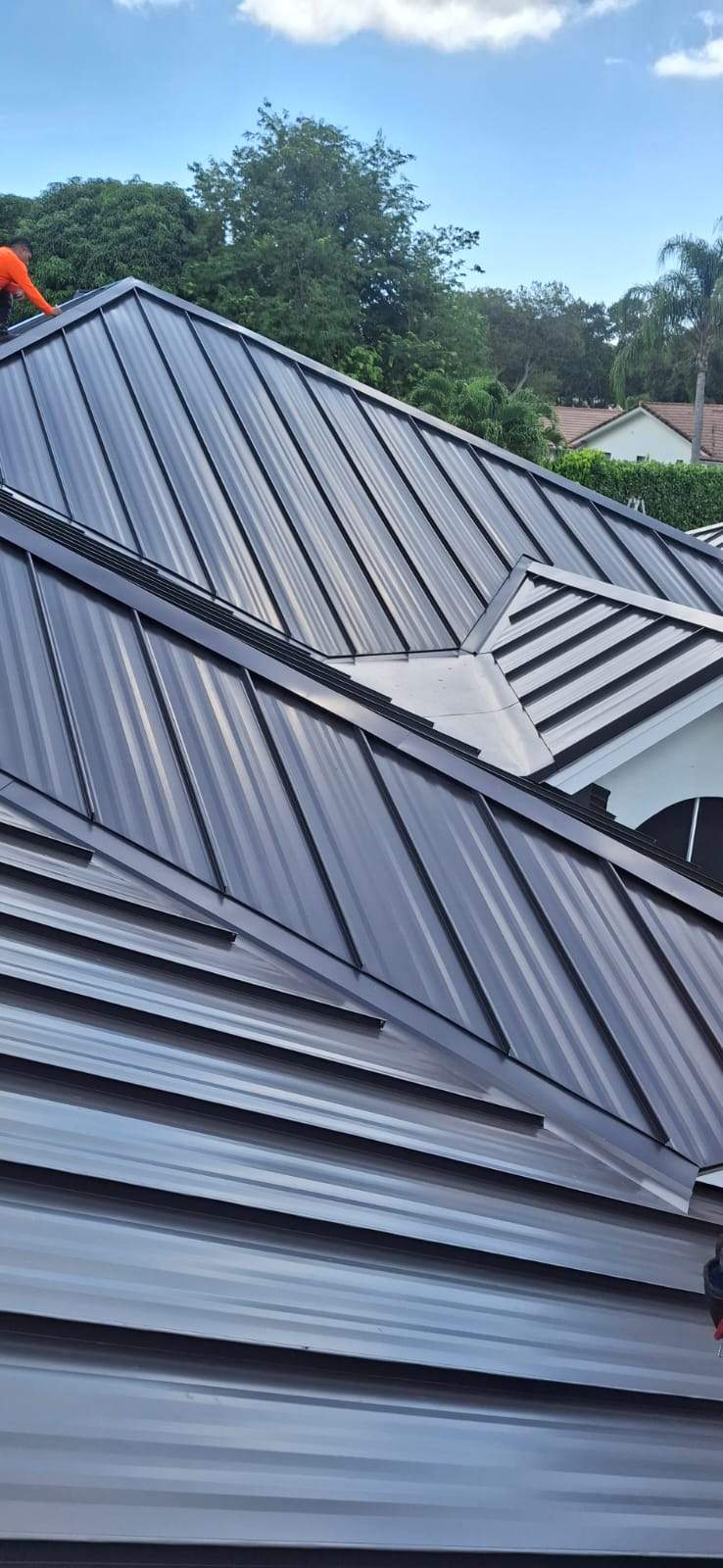 24ga 1.5" Mechanical Seam Dark Bronze by Total Roofing System The Metal Roof Experts
