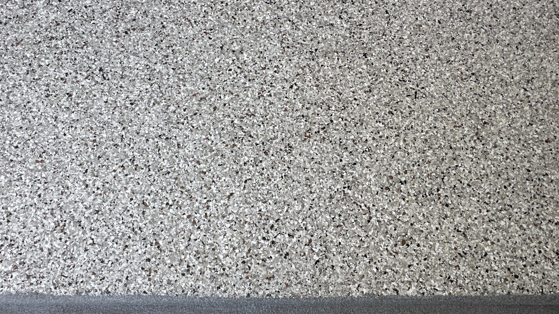 Phil B. new floor with Coyote flake by Banner Garage