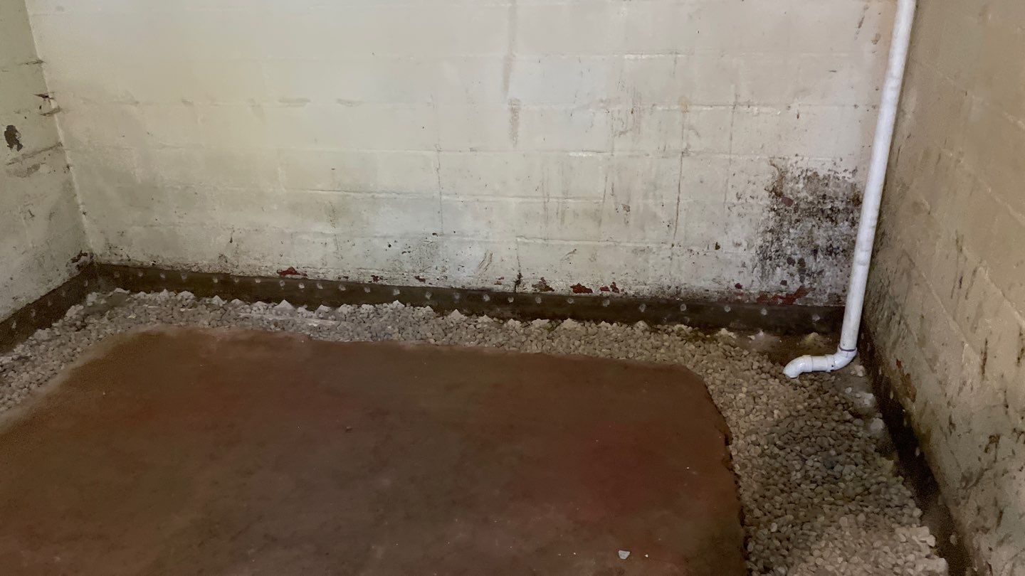 Interior Drain Tile & Sump Pump System in North Minneapolis by Waterproofing Northeast