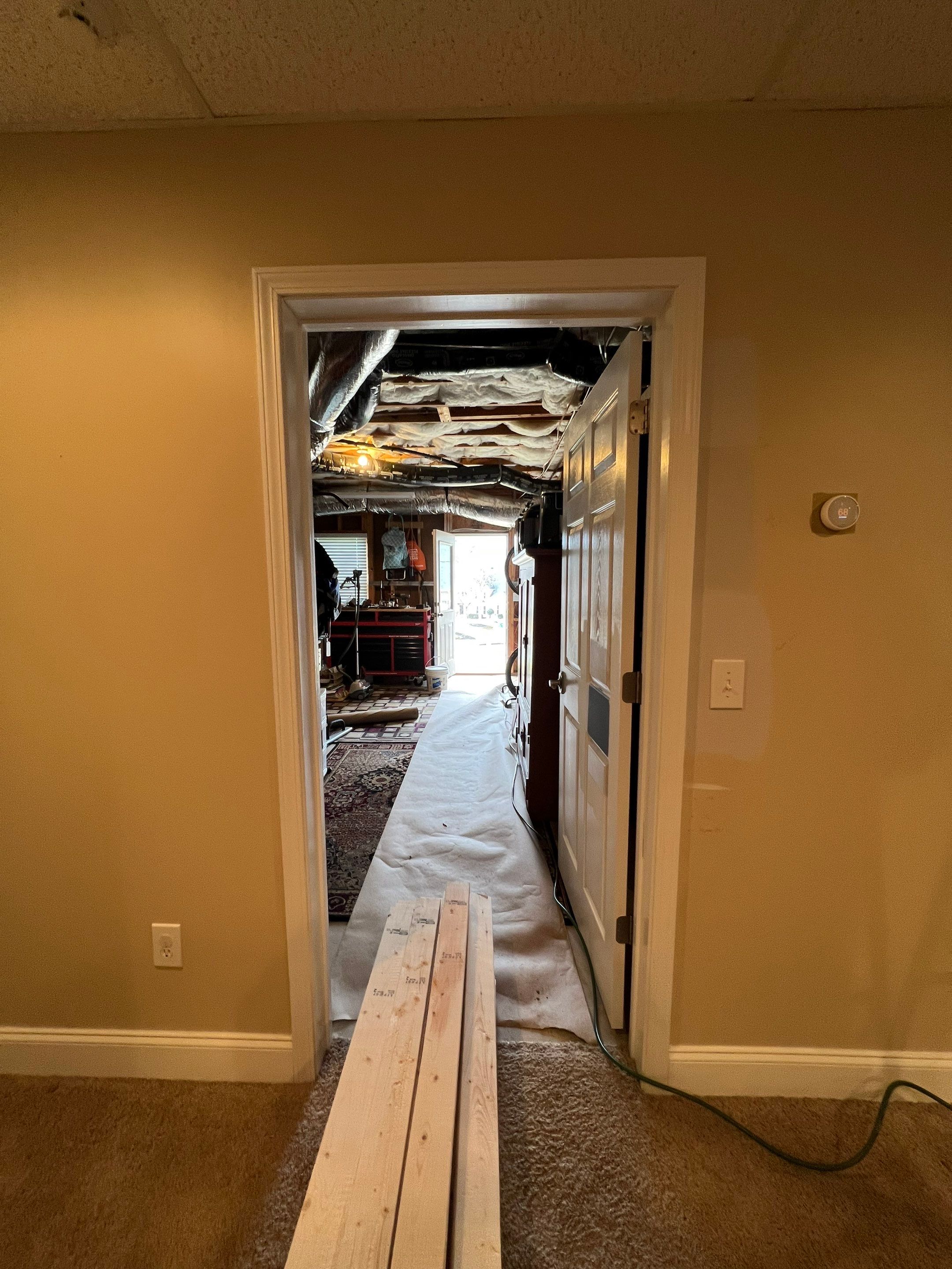 Modern Basement Remodeling in Woodstock with Custom Live-Edge Bar by Swift Home Renovations