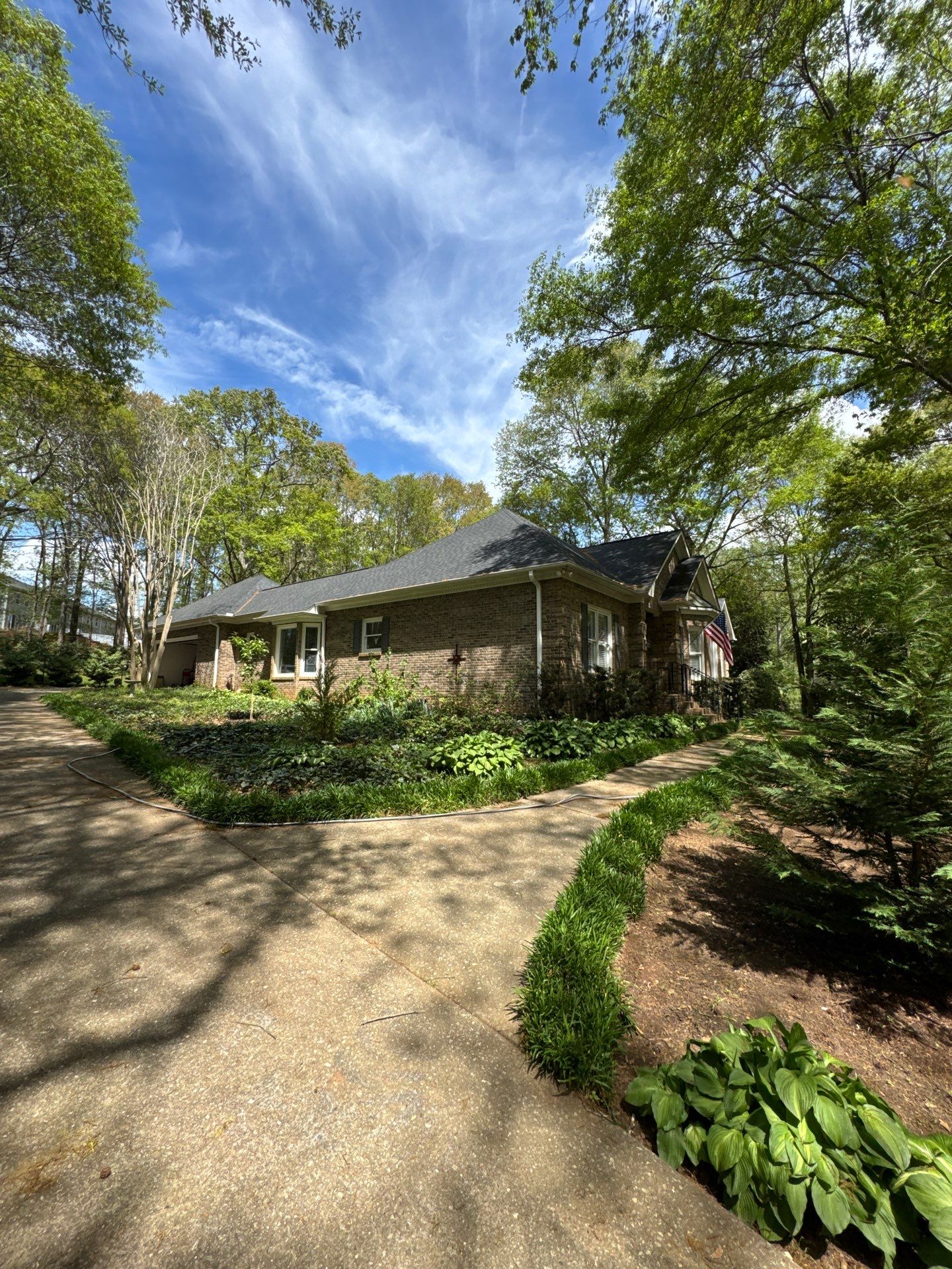 Spartanburg Residential Roof Replacement with Architectural Shingles and Skylights by Roofers LLC