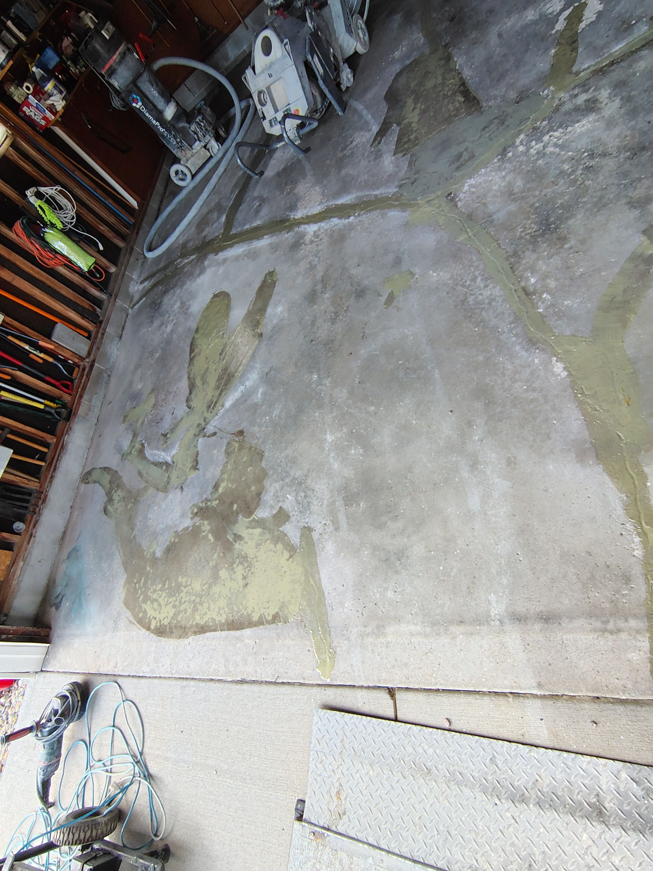 Sioux Falls Garage Epoxy Floor Installation and Concrete Crack Repair by Select Painting, Coatings & Garage Cabinets