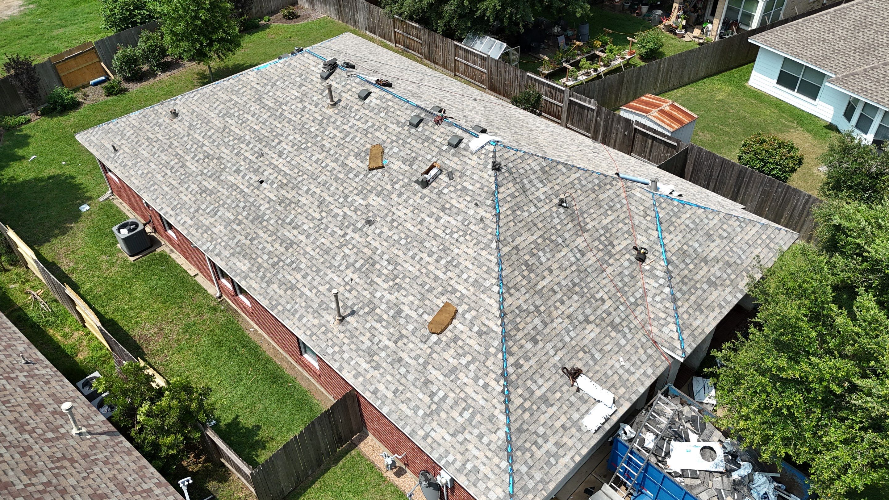 Residential Roofing & Gutter Installation using IKO Dynasty by Core Four Roofing
