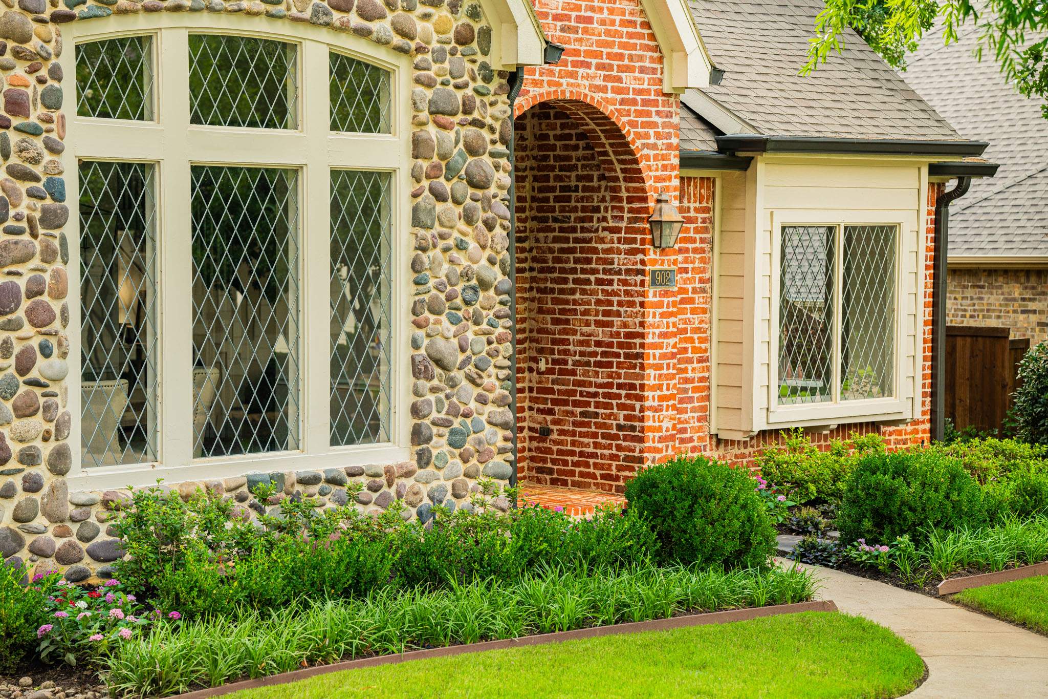 Southern Charm: Revitalizing a Cottage Garden by Complete Exterior Solutions