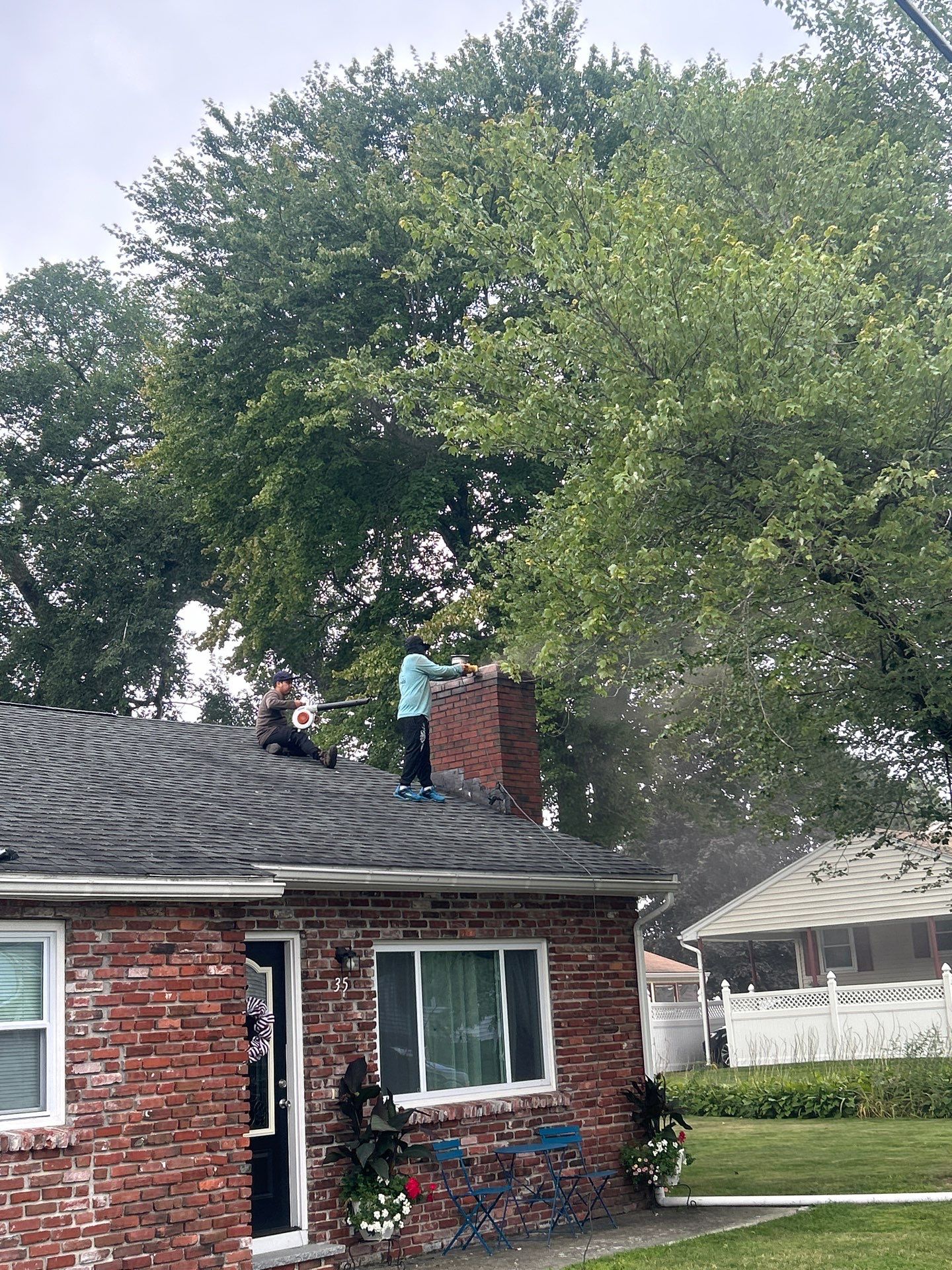 Lowell Premium Velux Curb-Mount Skylight & Chimney Restoration by Mighty Dog Roofing of Greater Middlesex County