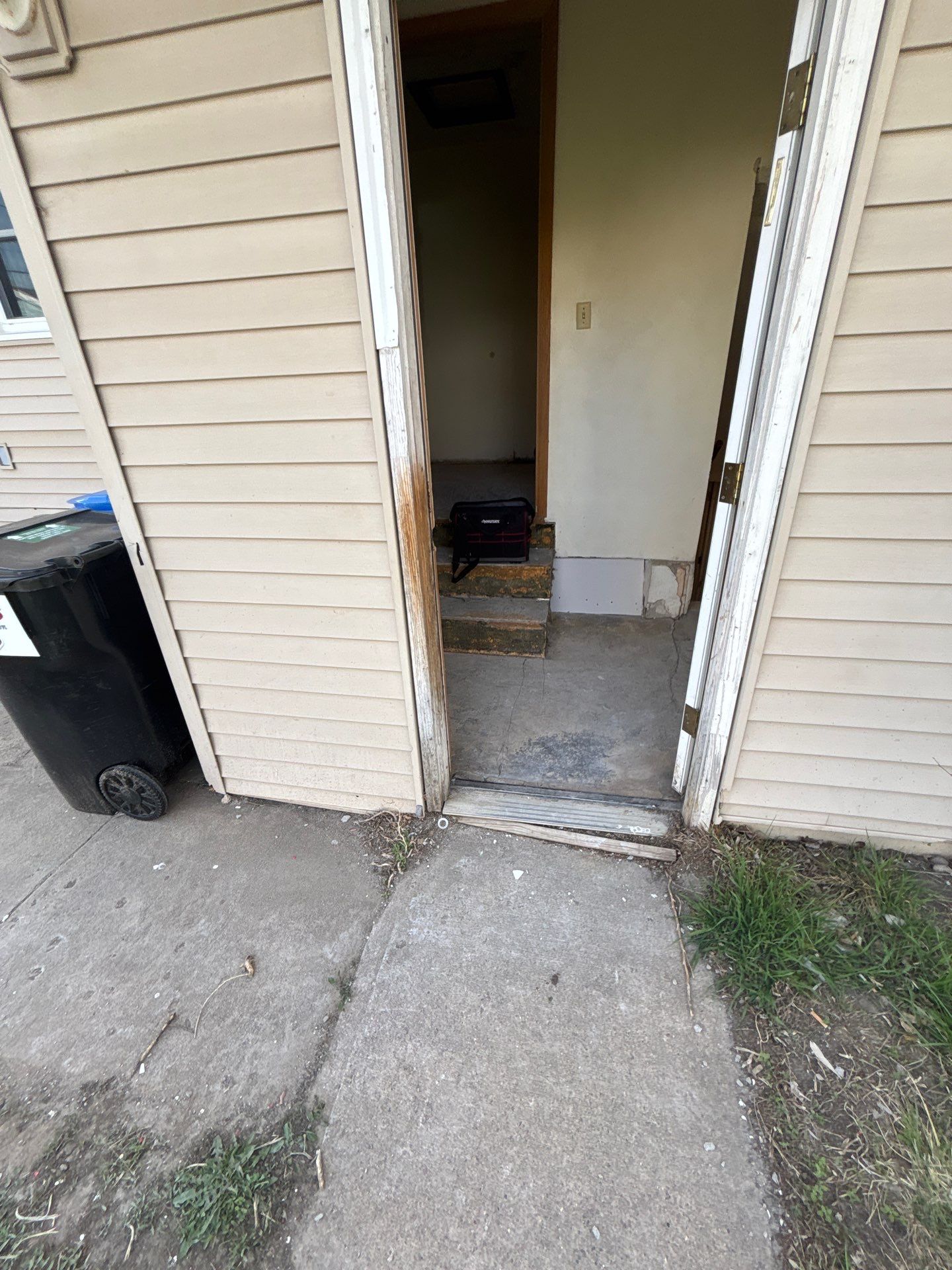 Comprehensive Basement Concrete Floor Coating and Crack Repair in Sioux Falls by Select Painting, Coatings & Garage Cabinets