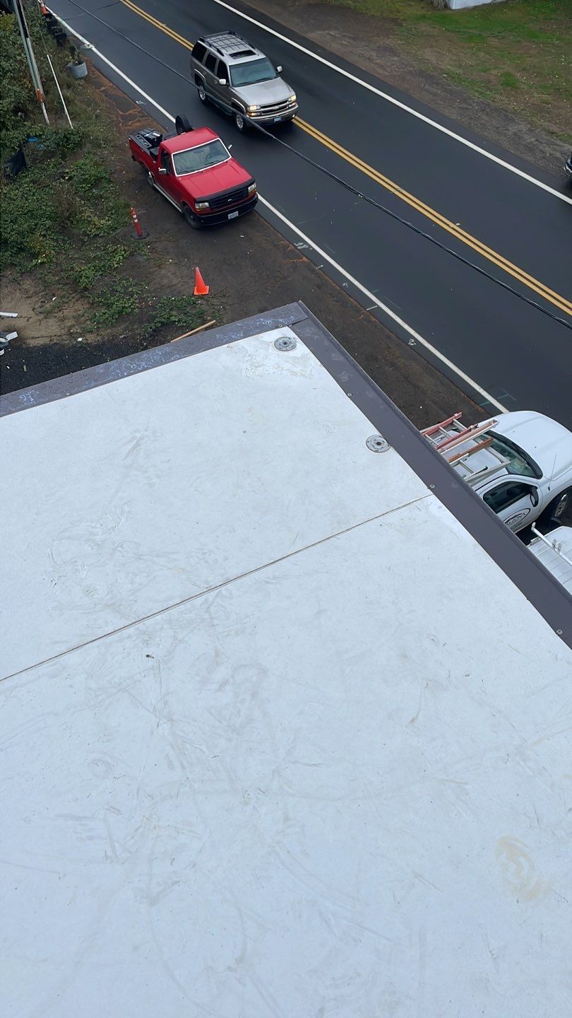 Commercial Roofing Installation using GAF 60Mil TPO  by Orezona Building & Roofing Company, Inc.
