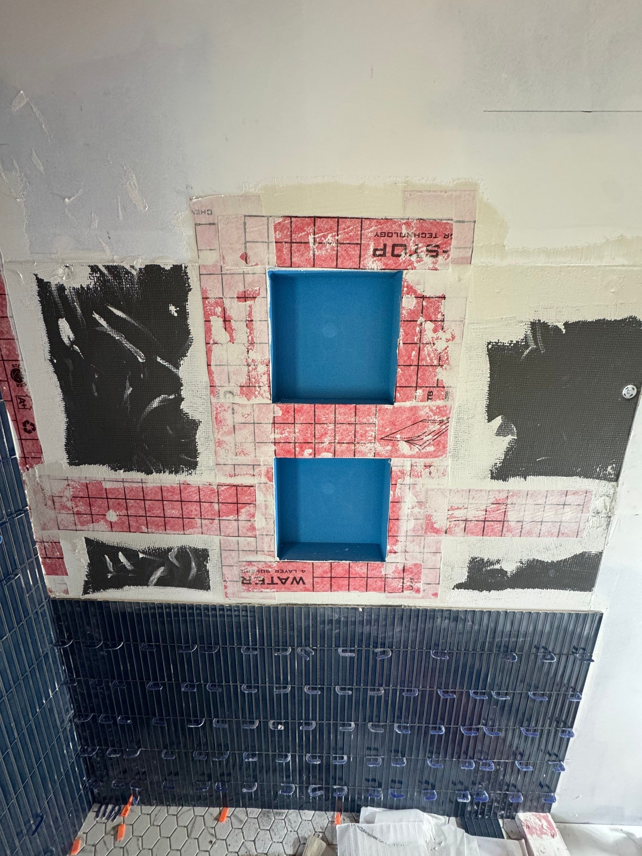 Brandt Double Bathroom Remodel by Integrity Tile and Home LLC