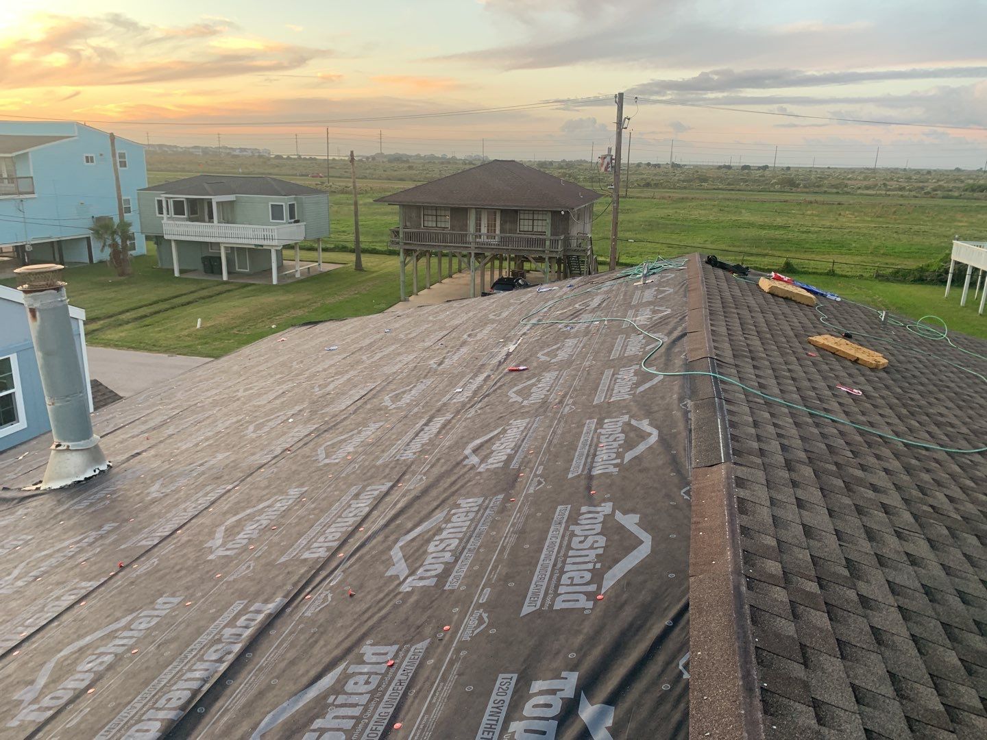 Galveston Waterfront Roof Installation In Progress by Elite Roofing LLC
