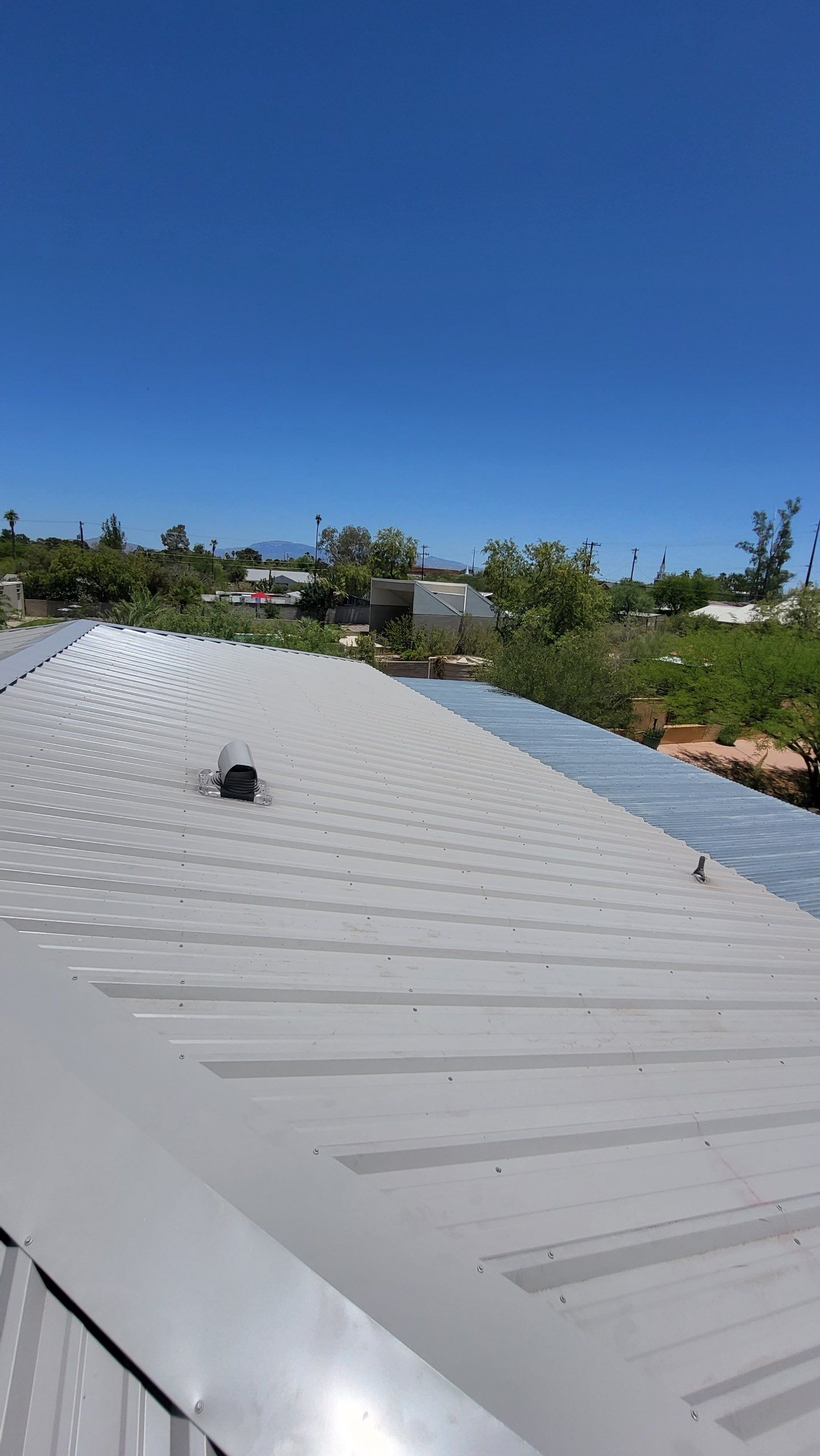 Light Stone Exposed Fastener by Reimagine Roofing