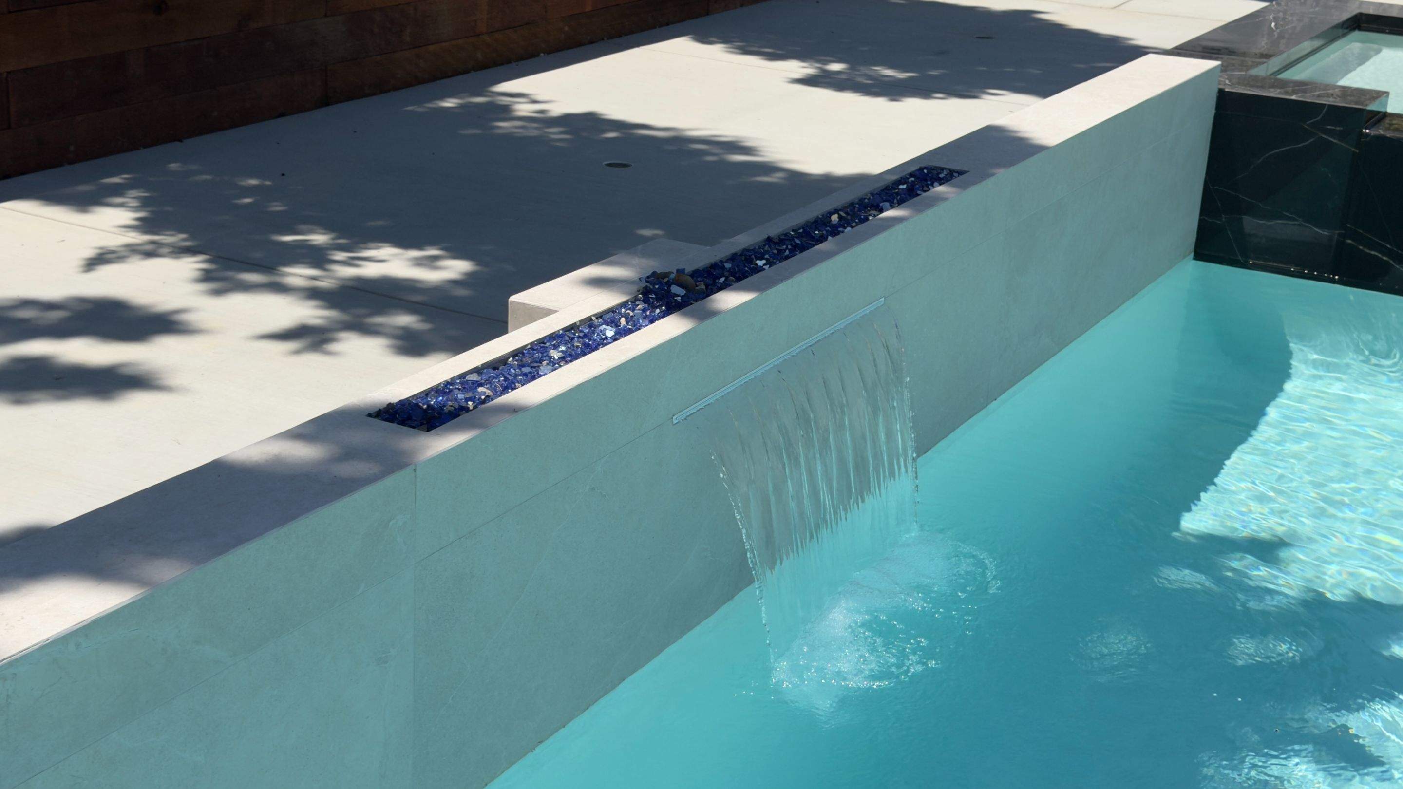 Pool With Raised Spa, Water/Fire Feature by Lax Home Inc 