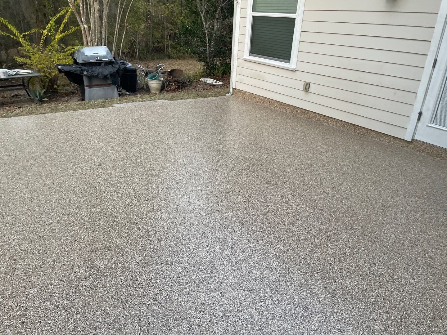 Patio  in Gainesville, FL in Sandstone by Cross Creek Concrete Coatings