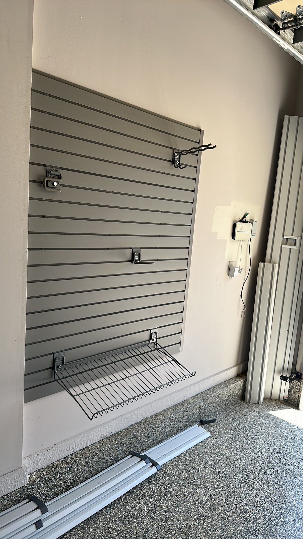 Lori H. upgrade her garage with cabinets and overhead racks by Banner Garage