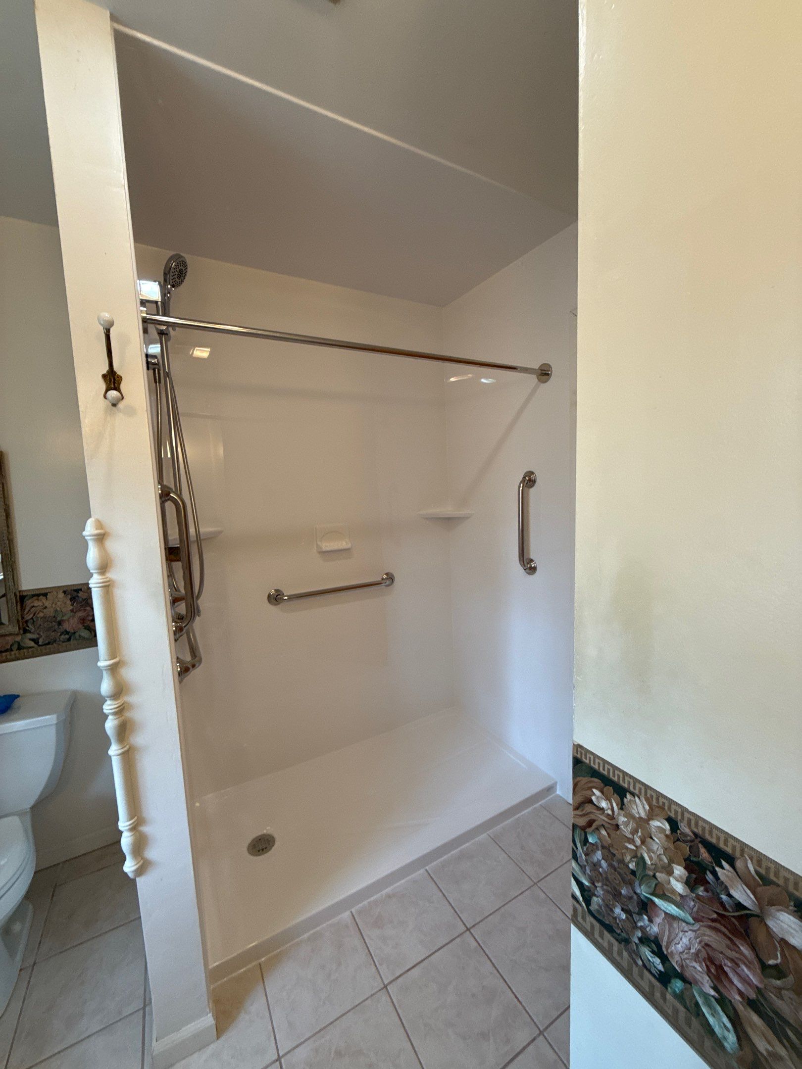 Jacuzzi Walk-In Shower Installation with Safety Grab Bars in Cadillac by Rainbow Seamless Systems