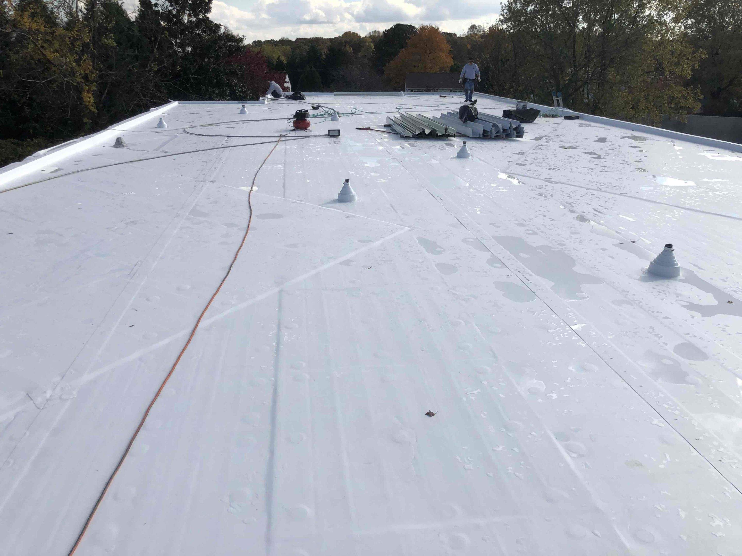 Roof Installation using Silicone TPO by ExteriorPros