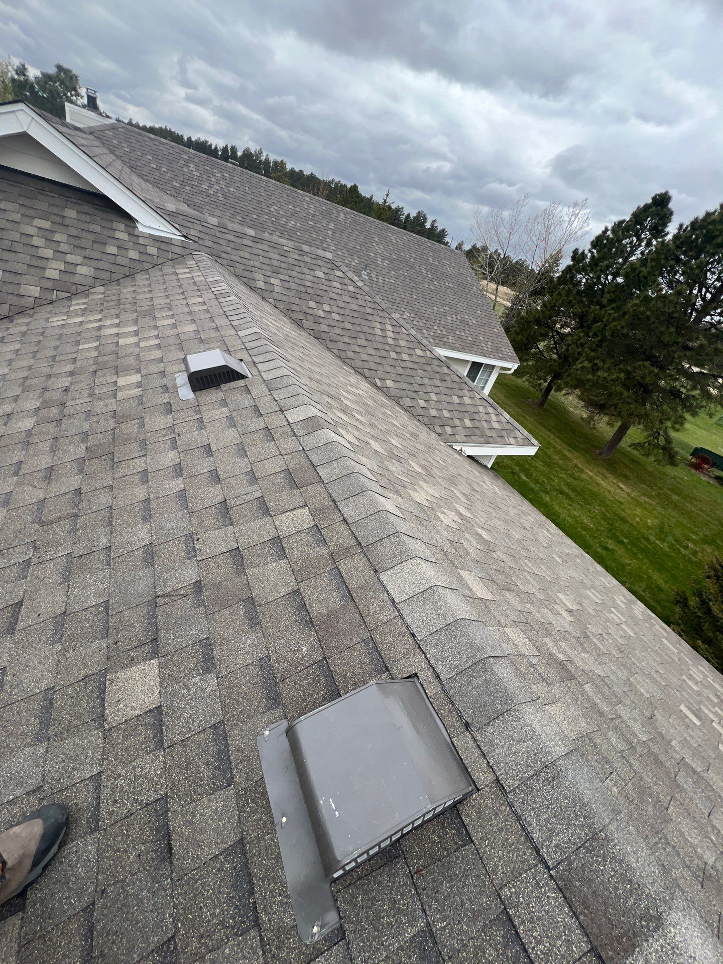 Residential Roofing Installation using Atlas Pinnacle Impact Weathered Wood by Blue Peaks Roofing LLC 