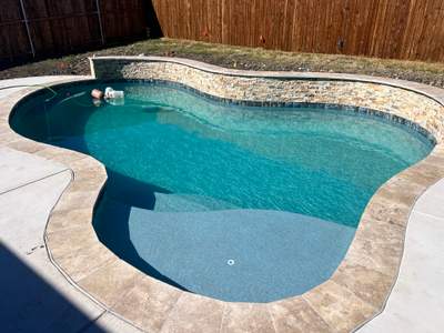 Freeform Pool with Rock Accents and Spa