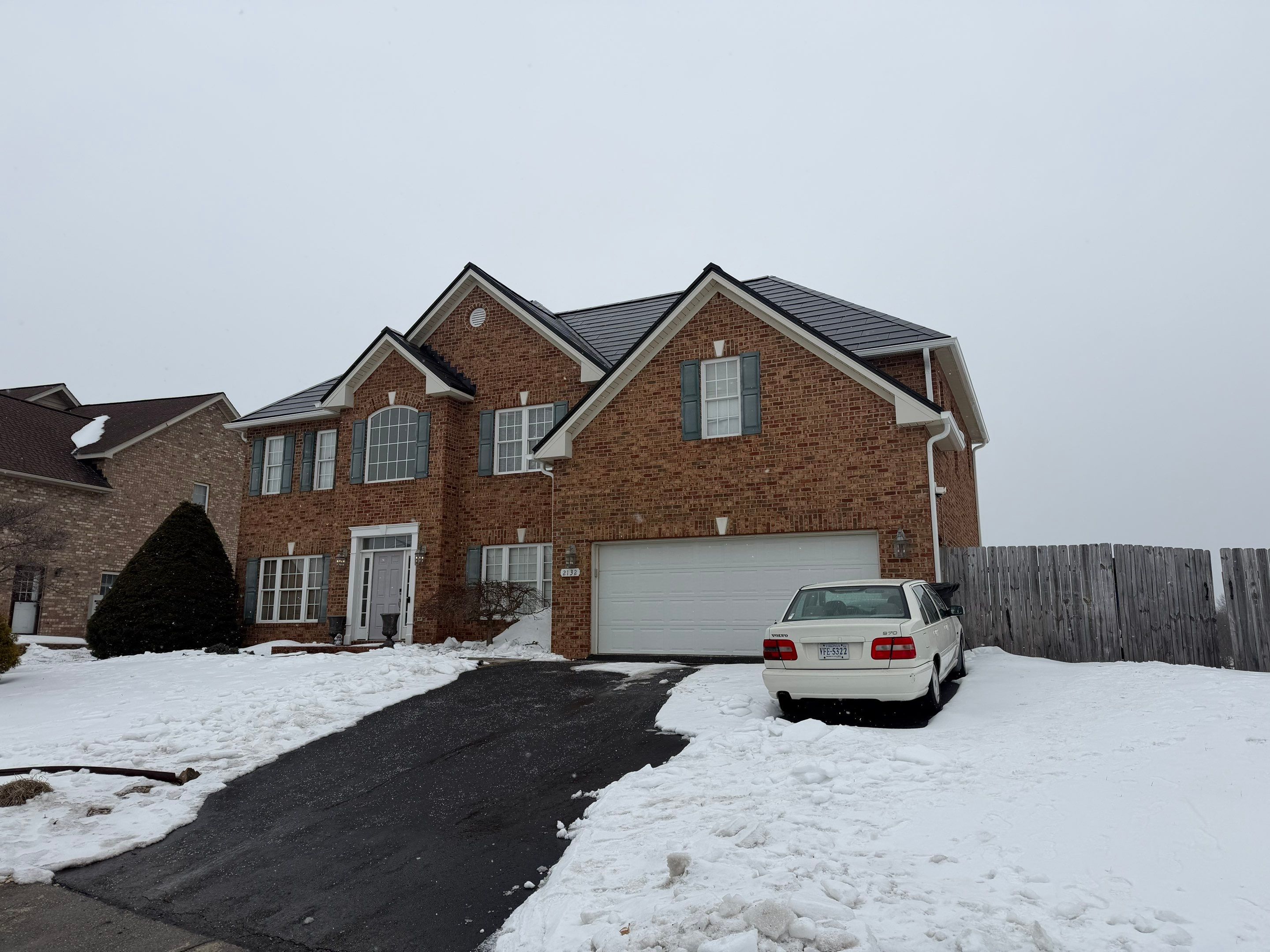 Winter Tesla Solar Roof Installation! by American Home Contractors