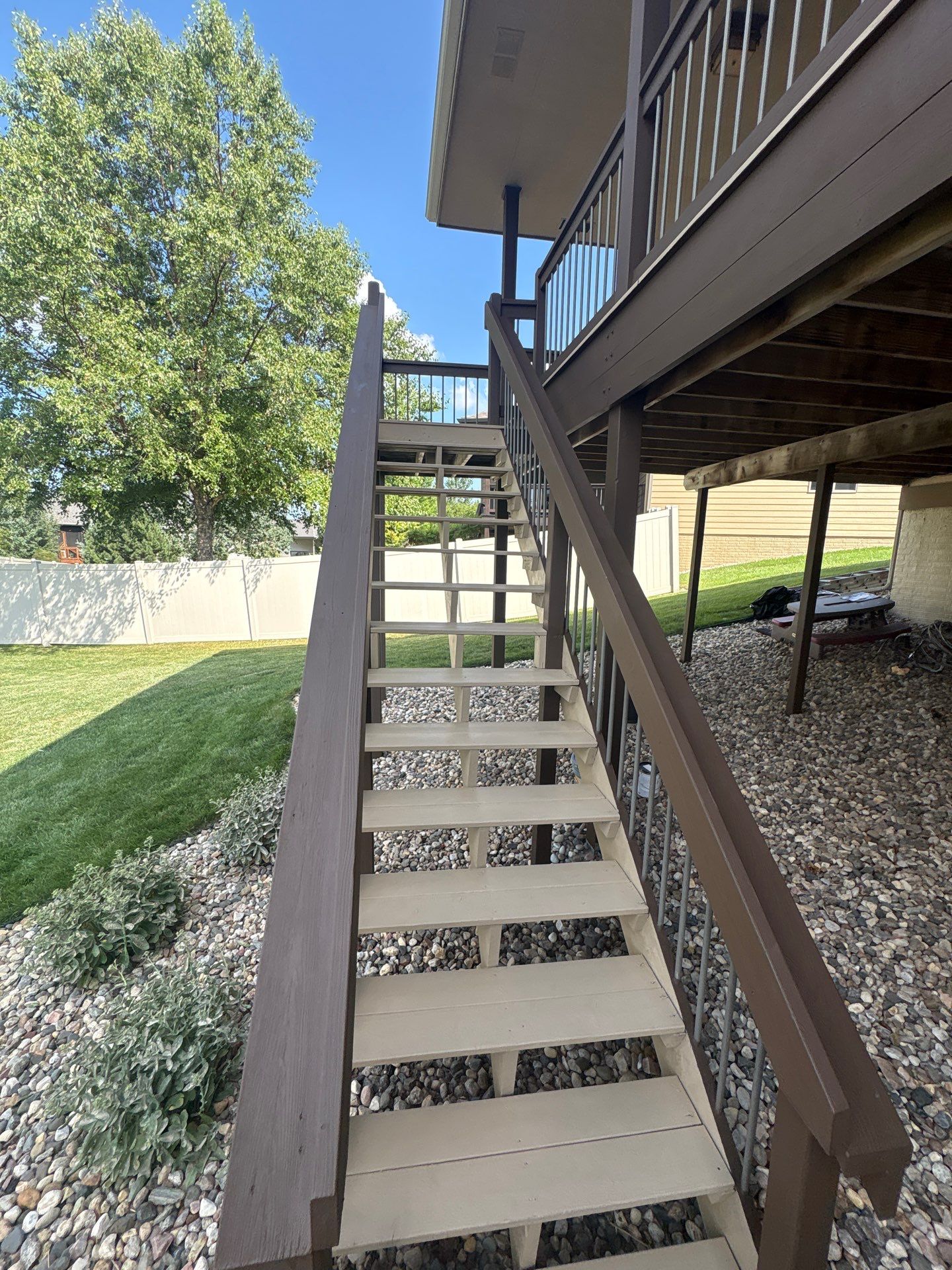 Sioux Falls Exterior Refresh and Multi-Level Deck Maintenance by Select Painting, Coatings & Garage Cabinets