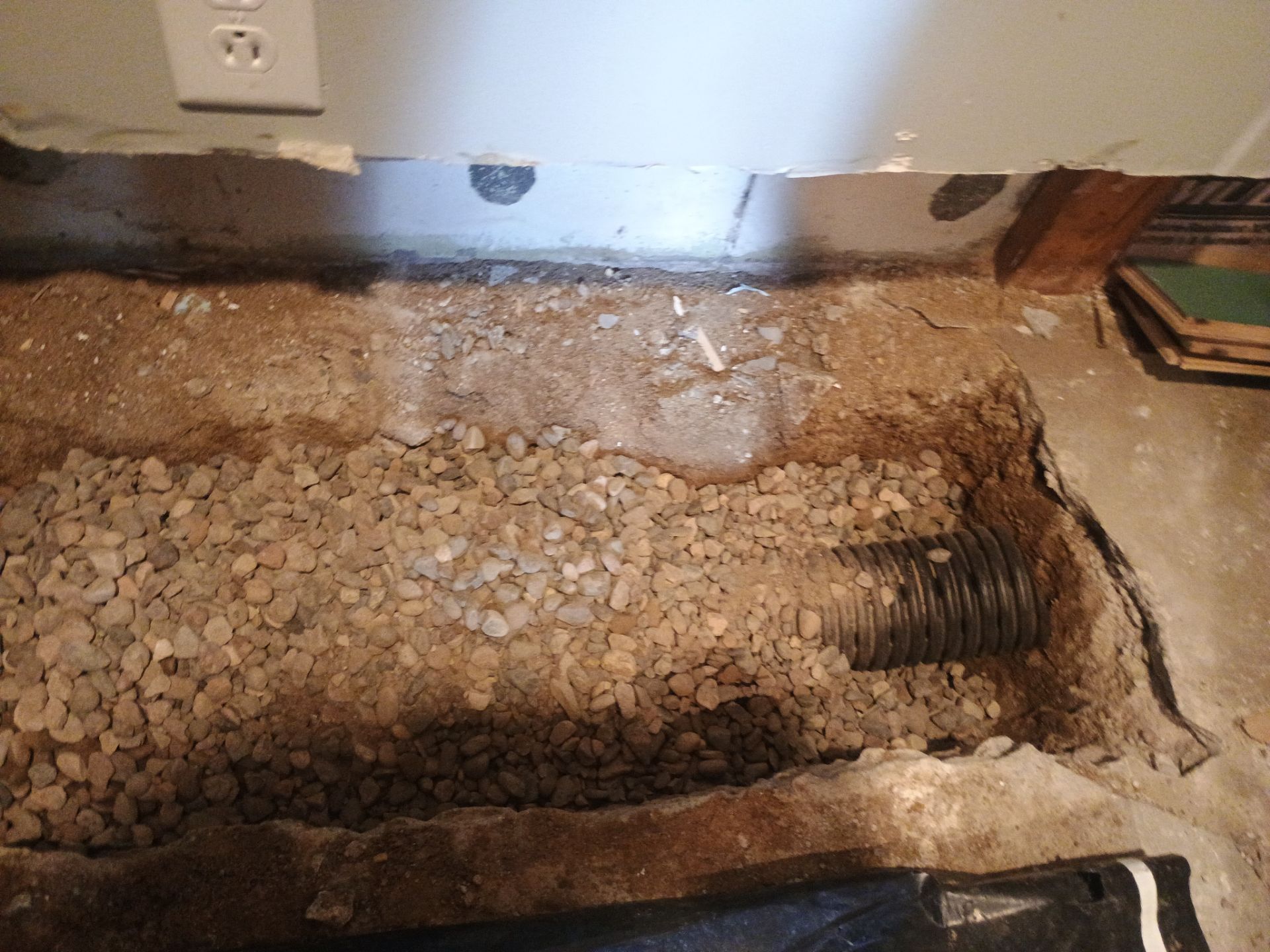 Interior Drain Tile in a Finished South Minneapolis Basement by Waterproofing Northeast