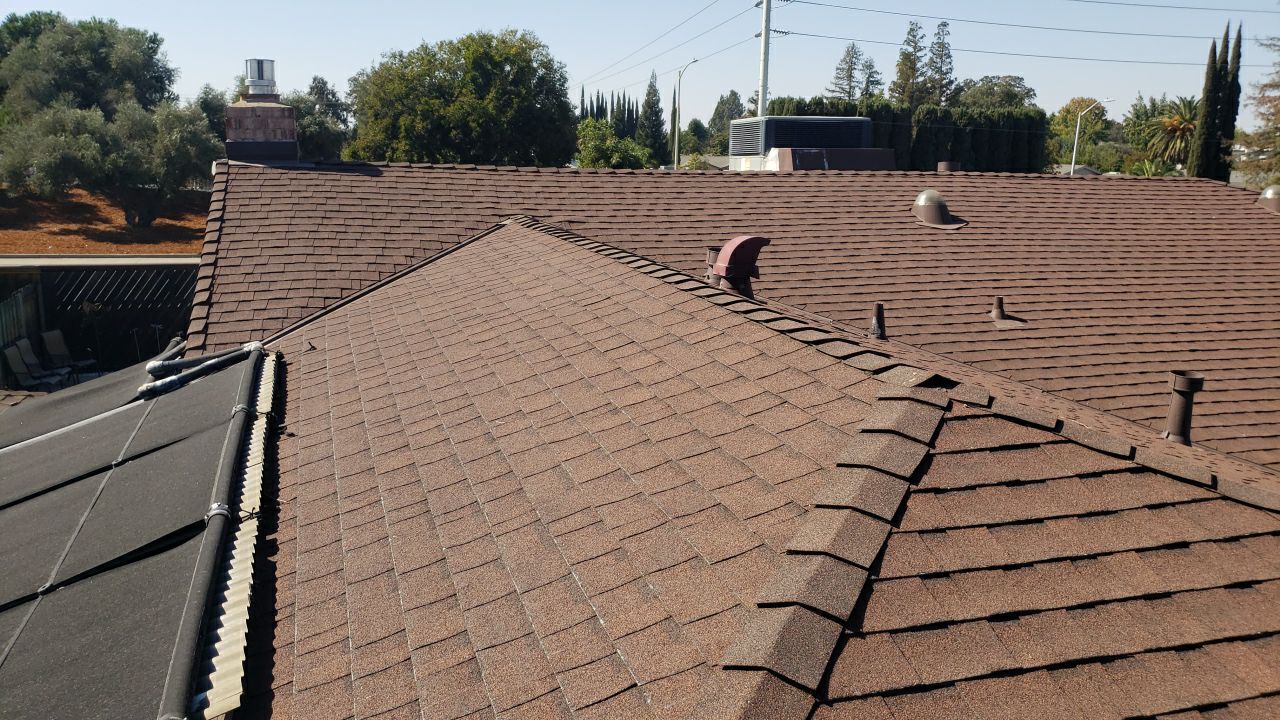 Roofing and Gutters to protect this home by Byers Enterprises