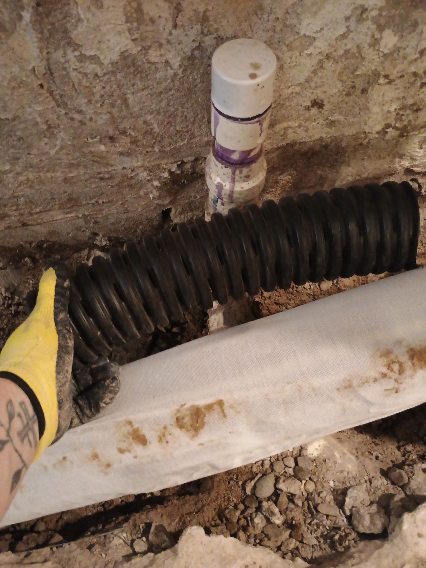 Drain Tile in Minneapolis for Kristen & Taylor by Waterproofing Northeast