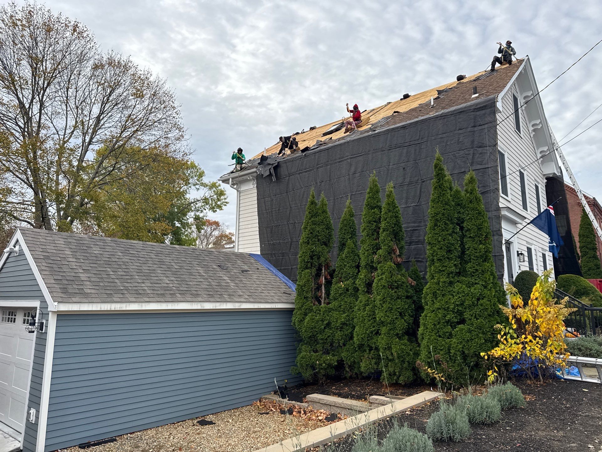 Newburyport Complete Roof Replacement with Solar Venting Skylight by Mighty Dog Roofing of Greater Middlesex County