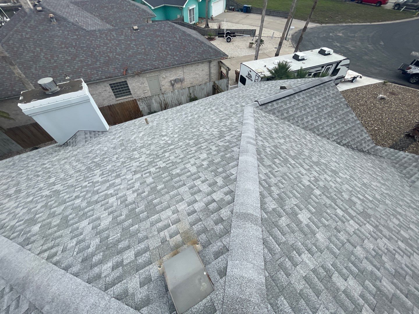 Residential Roofing Repair using Galvanized Chimney Cap & Chase by Lighthouse Roofing