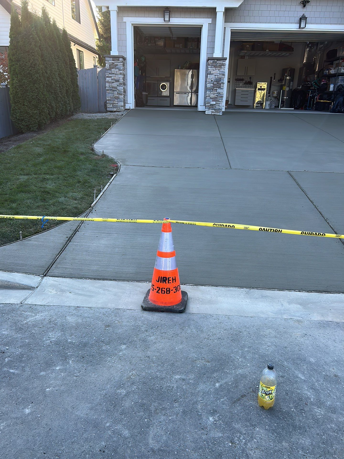 MN Custom Homes | Concrete Driveway  by Jireh Asphalt & Concrete Inc 