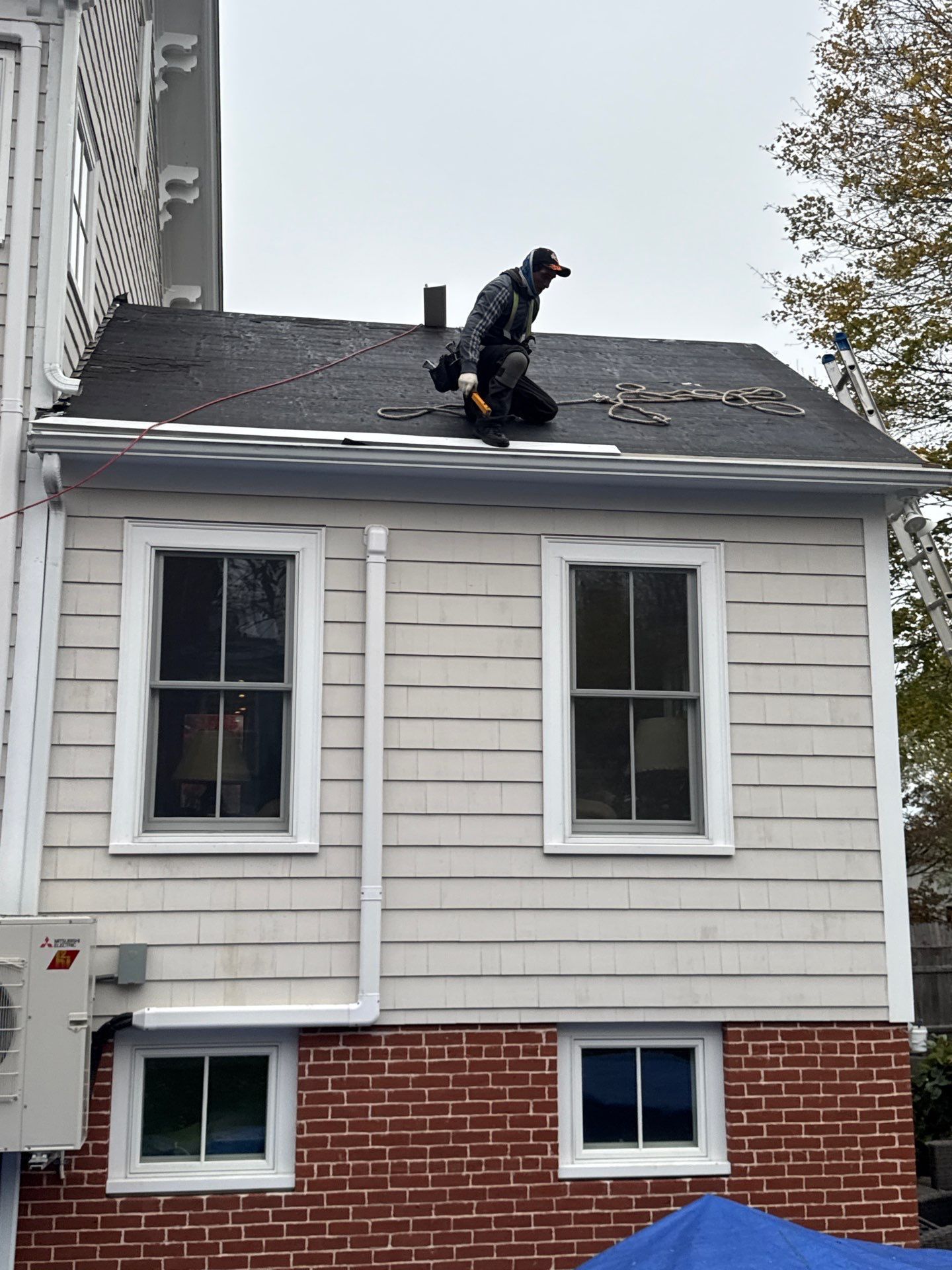 Newburyport Complete Roof Replacement with Solar Venting Skylight by Mighty Dog Roofing of Greater Middlesex County