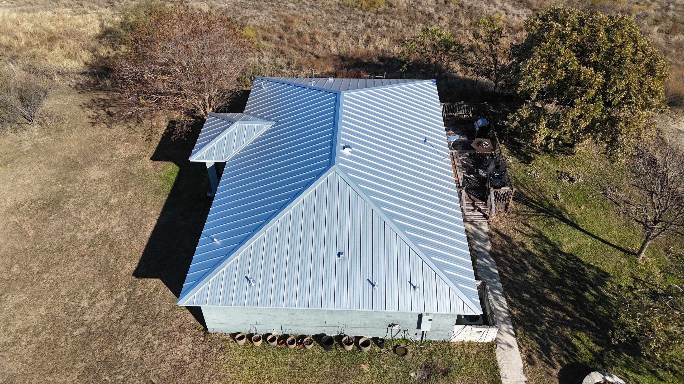 Residential Roof Replacement using 24 GA Standing Seam by Action Exteriors Austin