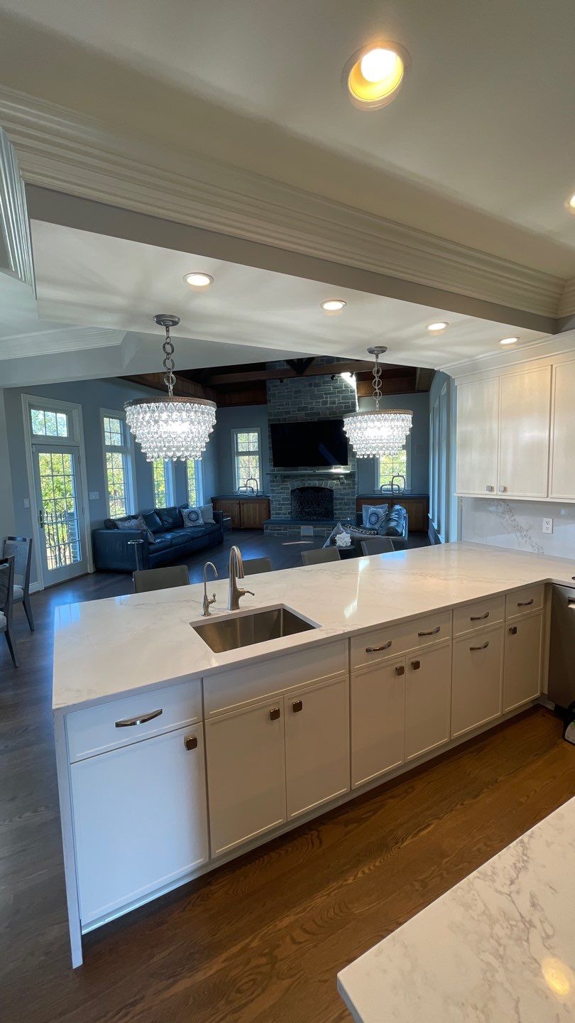 Kitchen Remodel using Fabuwood Luna Dove and Indigo Cabinetry by HomeWerkes Design & Build