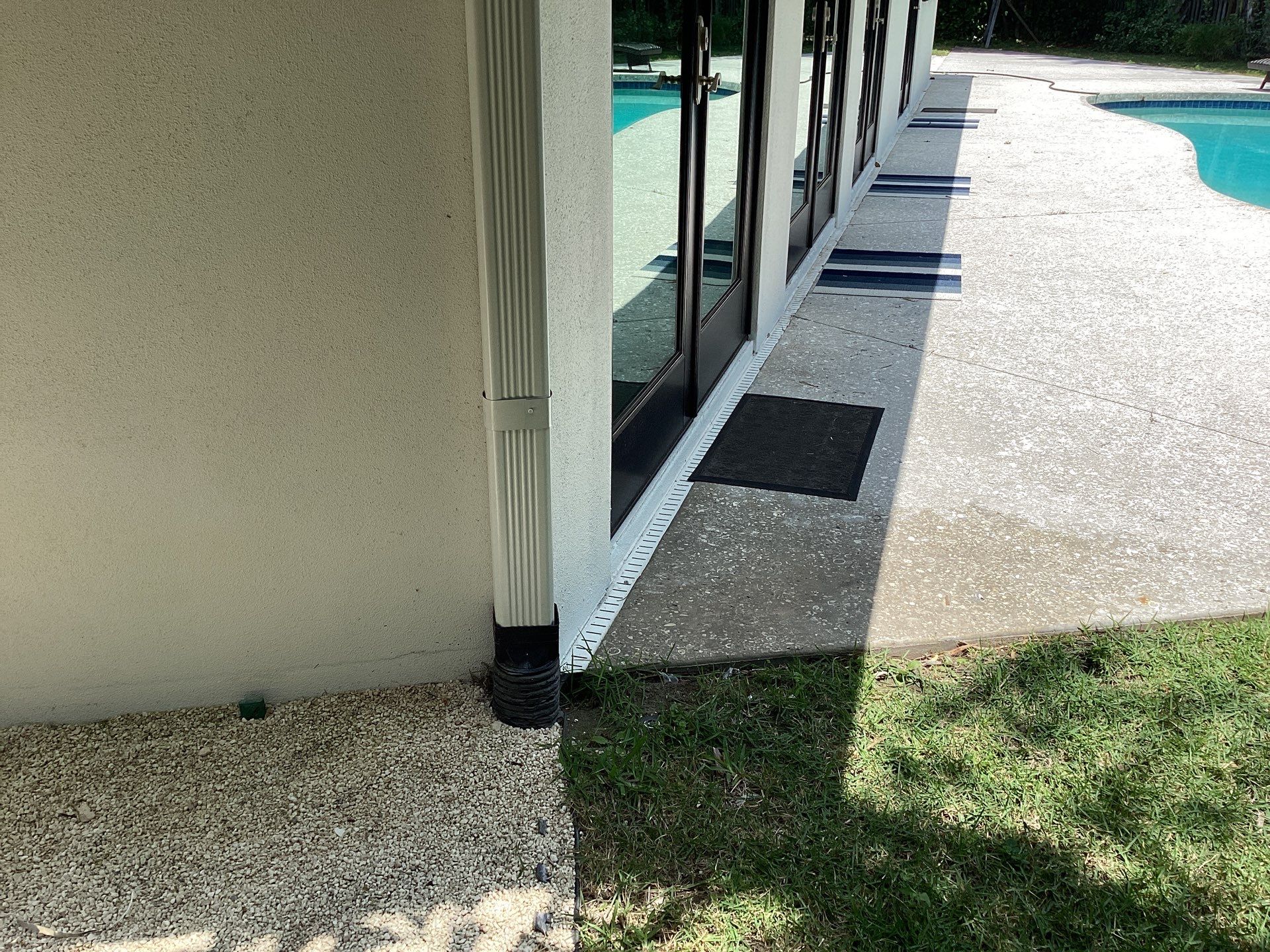 White Seamless Gutters and Downspouts in Sarasota FL by Gutter Professors