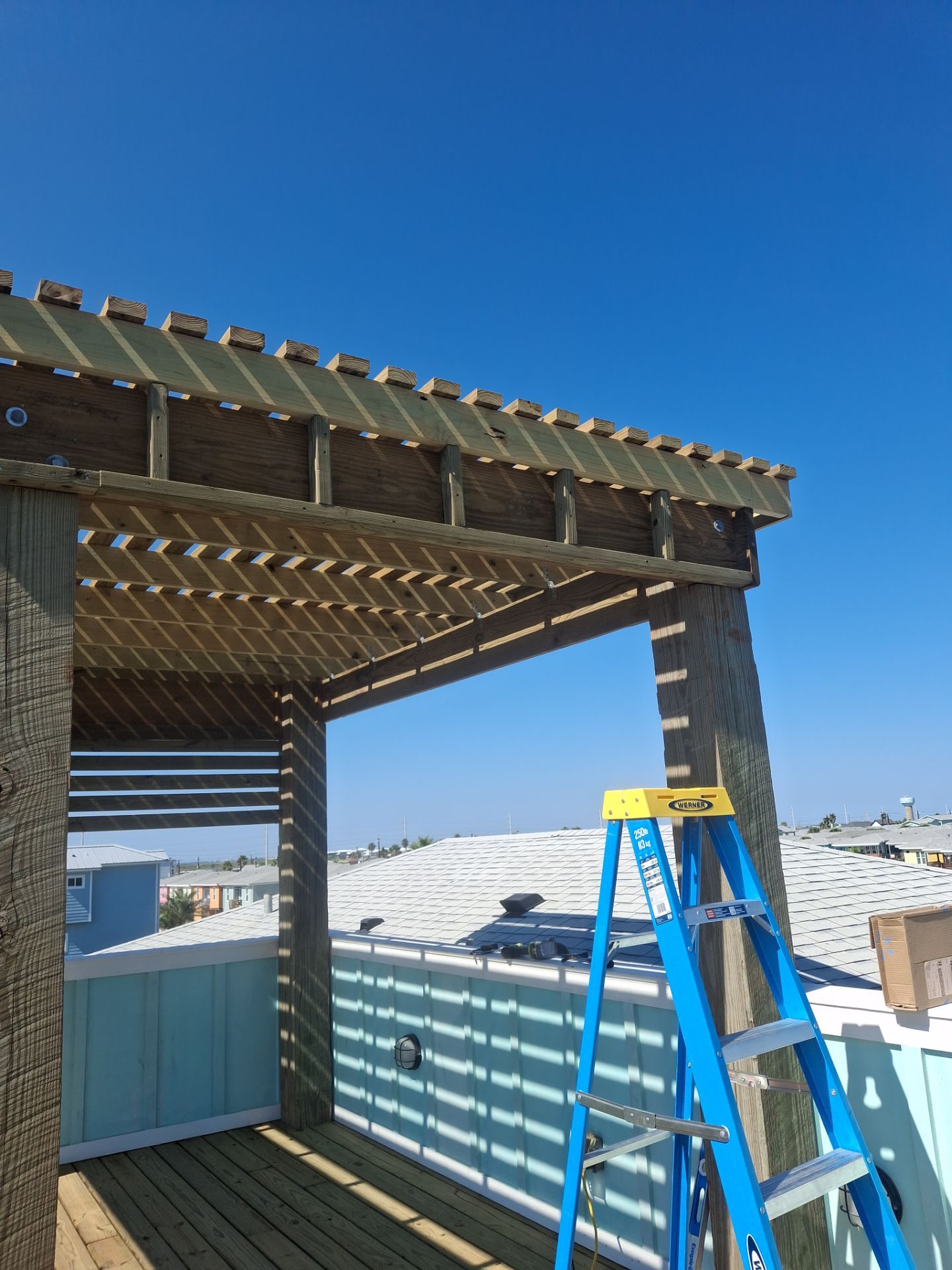 Roof Top Clubhouse on the Beach by Bayfront Roofing and Construction