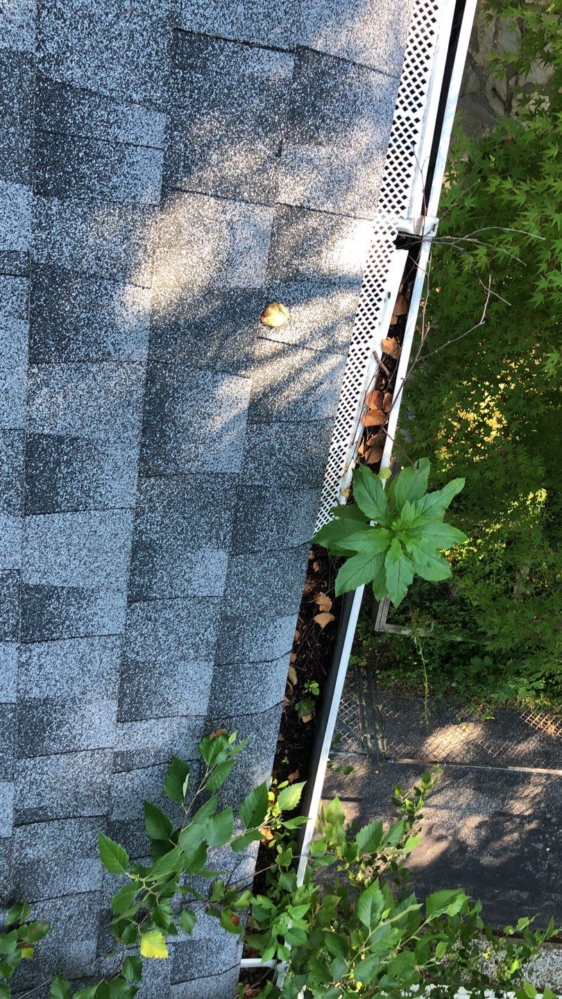 Gutter Cleaning by American Home Contractors
