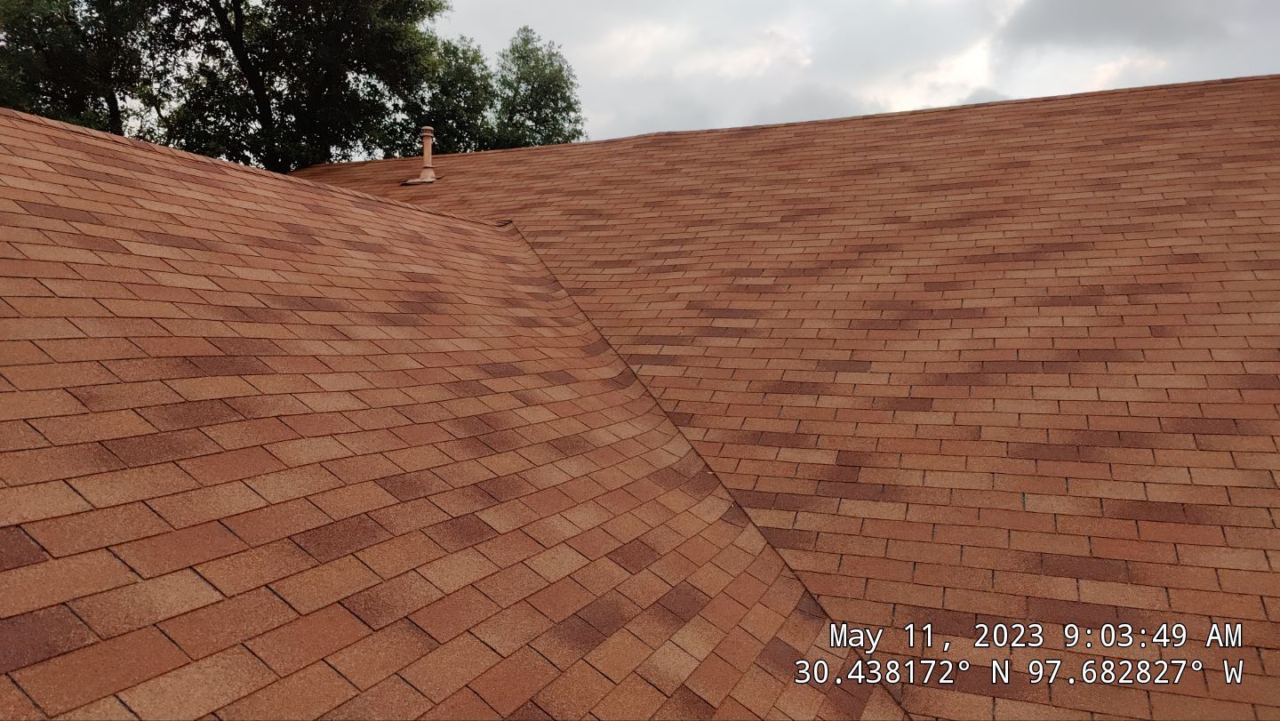 New Roof Installation Of IKO Dynasty Color Brownstone by DeZign Roofing & Exteriors