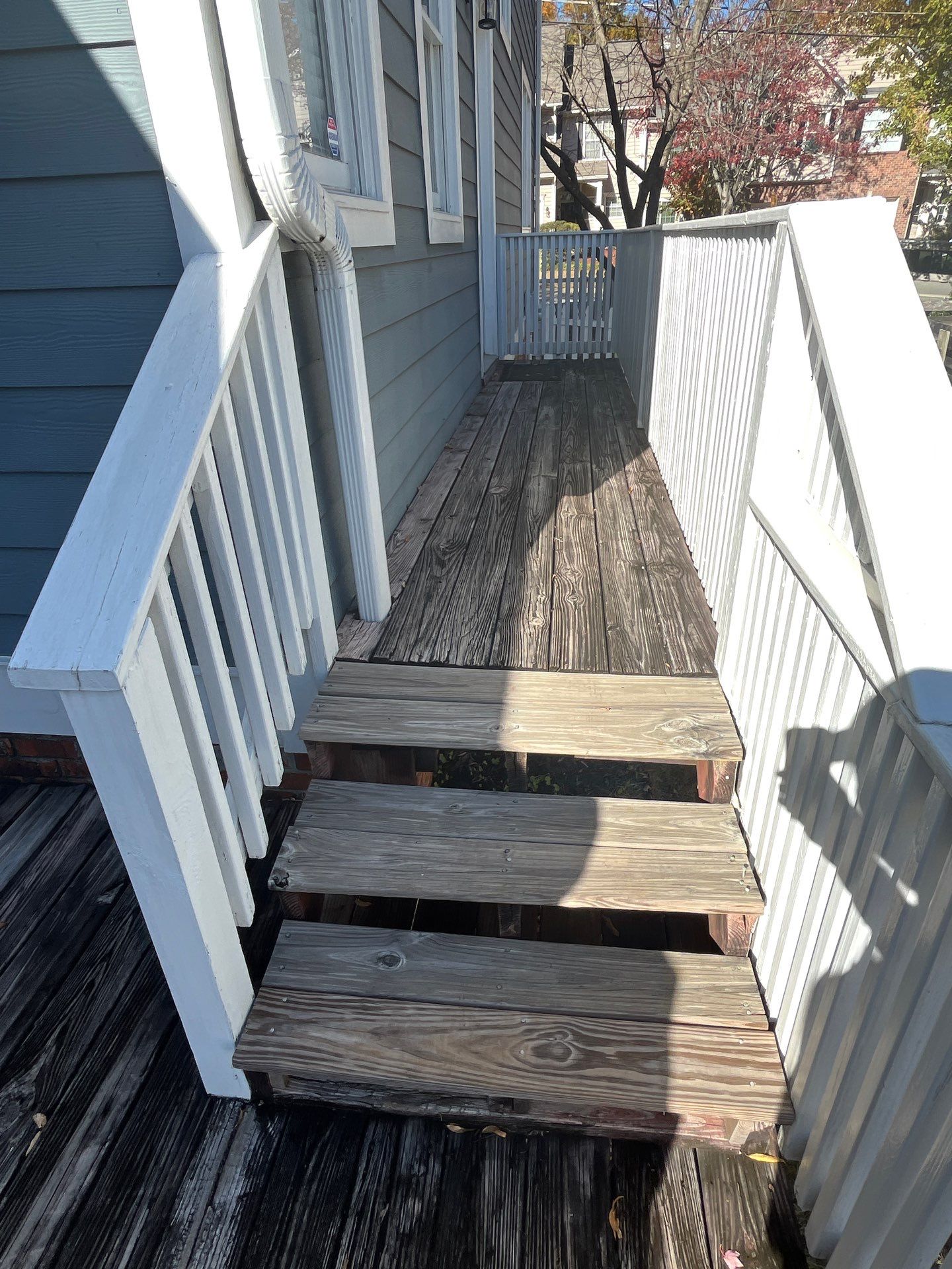 Atlanta, GA Deck Rebuild and Pergola Build using Deckorators Venture Series Decking, Trex Composite Railing, and Pressure Treated Pine by Nelson Exteriors 