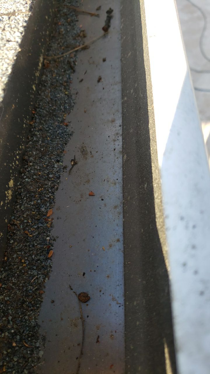 Gutter Cleaning using water by Power Wash Masters LLC