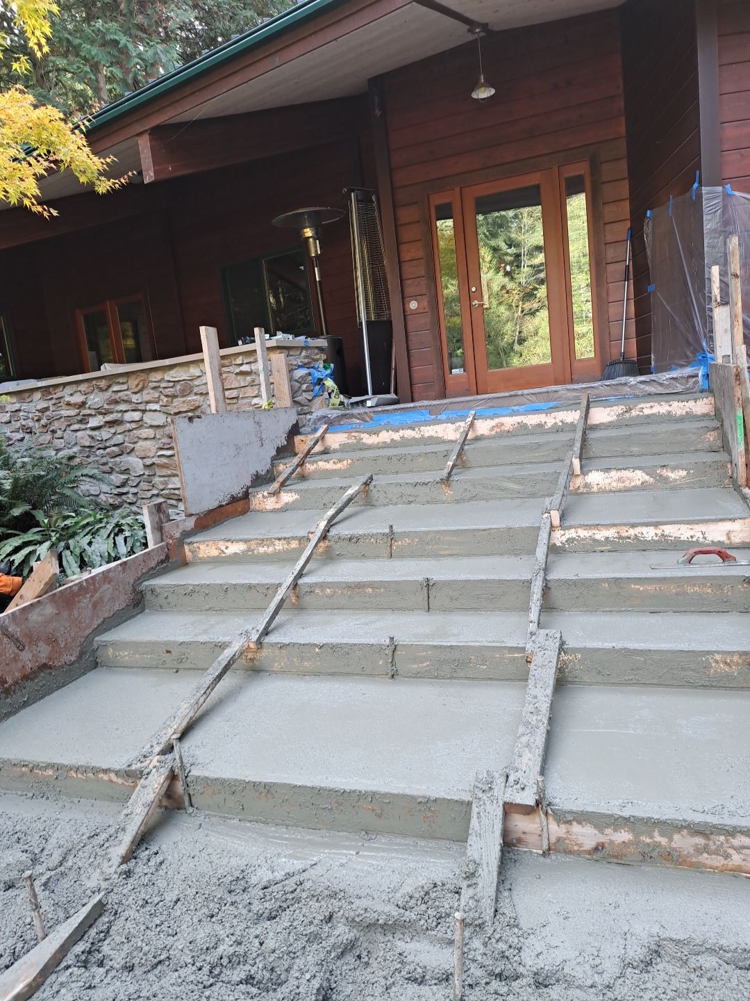 Pia | Custom Concrete Driveway, Walkway & Floating Steps by Jireh Asphalt & Concrete Inc 