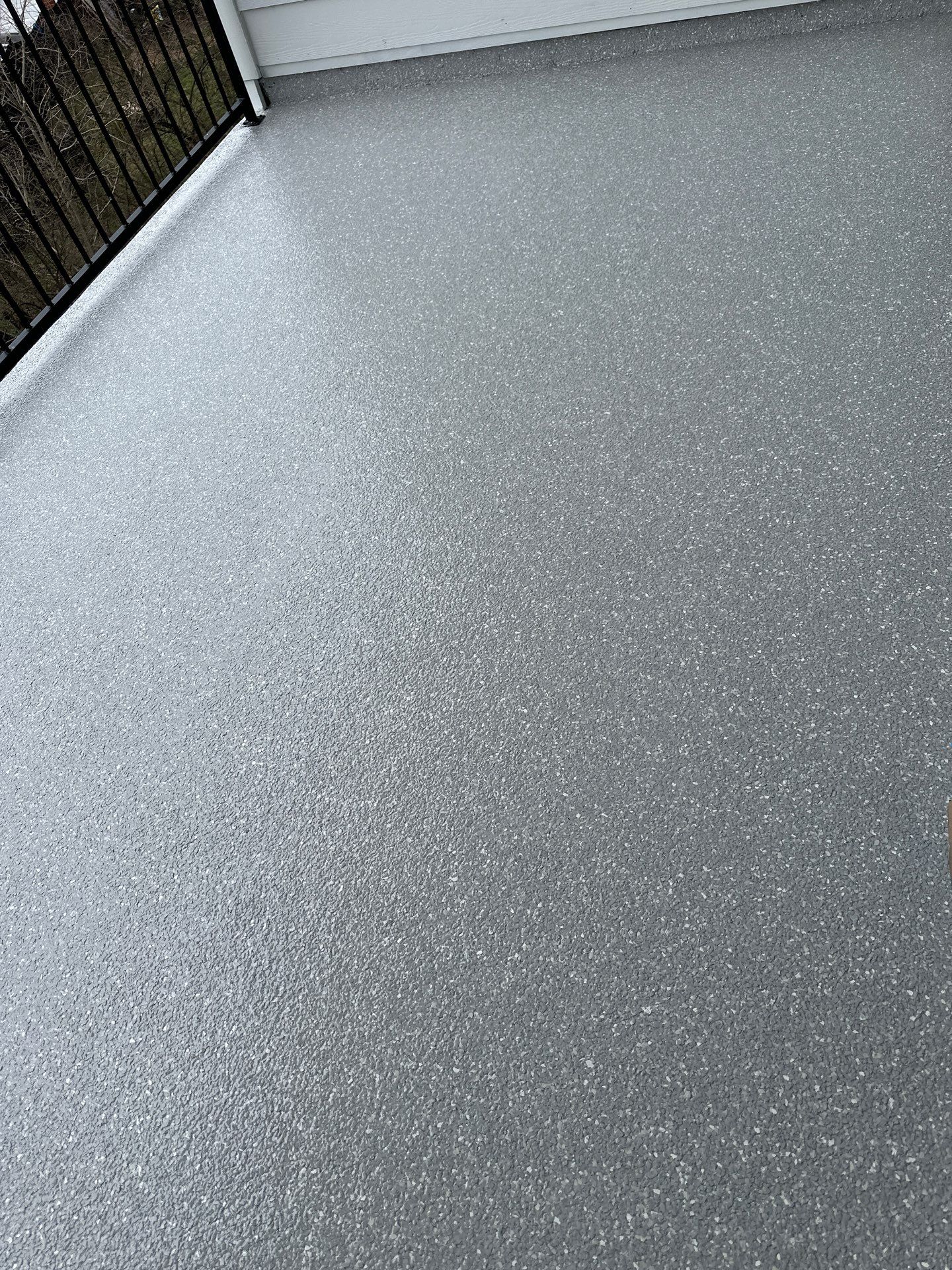 Patio Floor Coating using Custom Color by My Garage Floor Guys