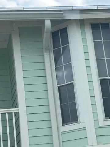 3x4 elbow Downspouts in Sanibel FL by Gutter Professors