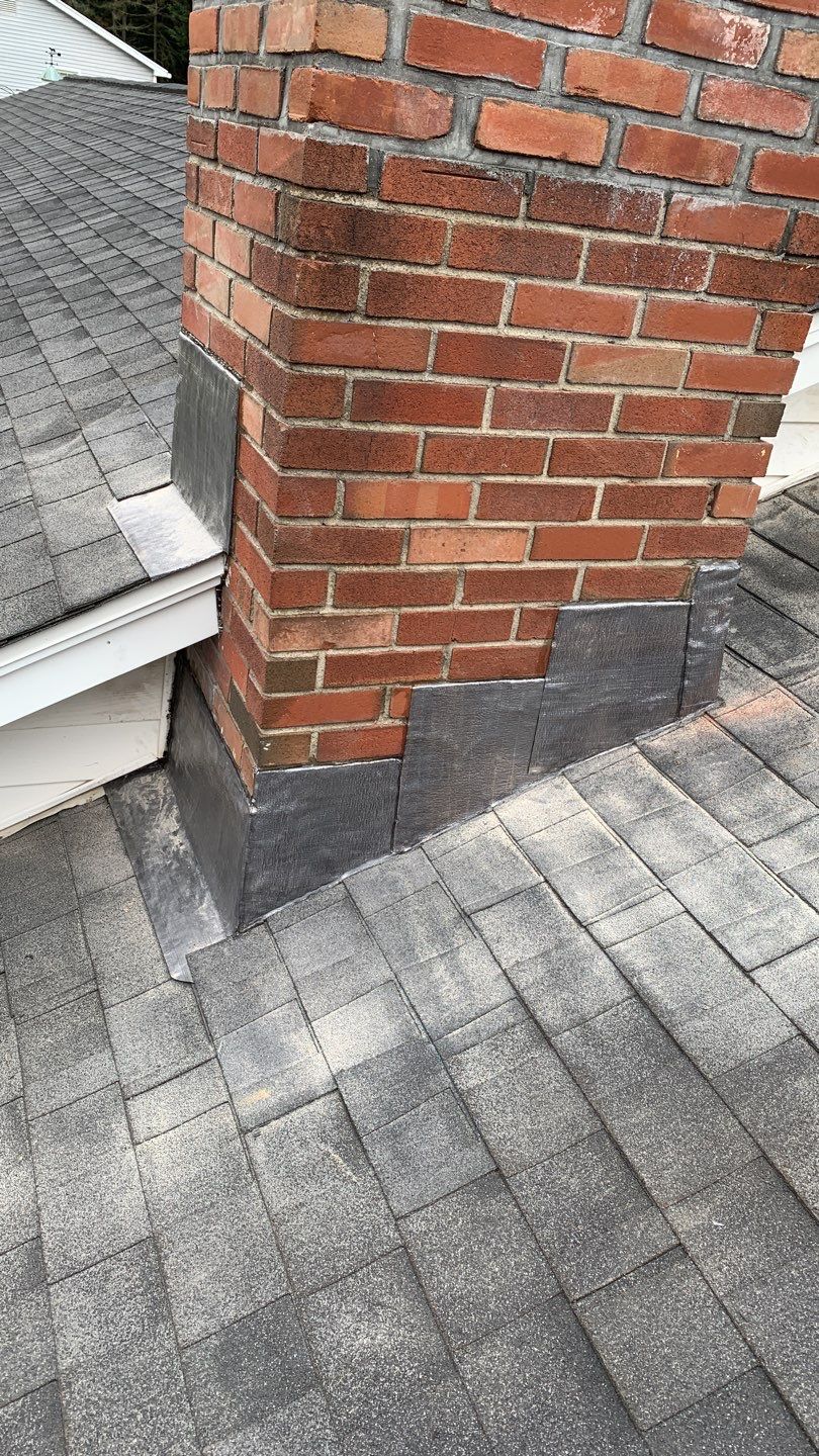 Residential Roofing Repair using Chimney Flashing by A Plus Exterior