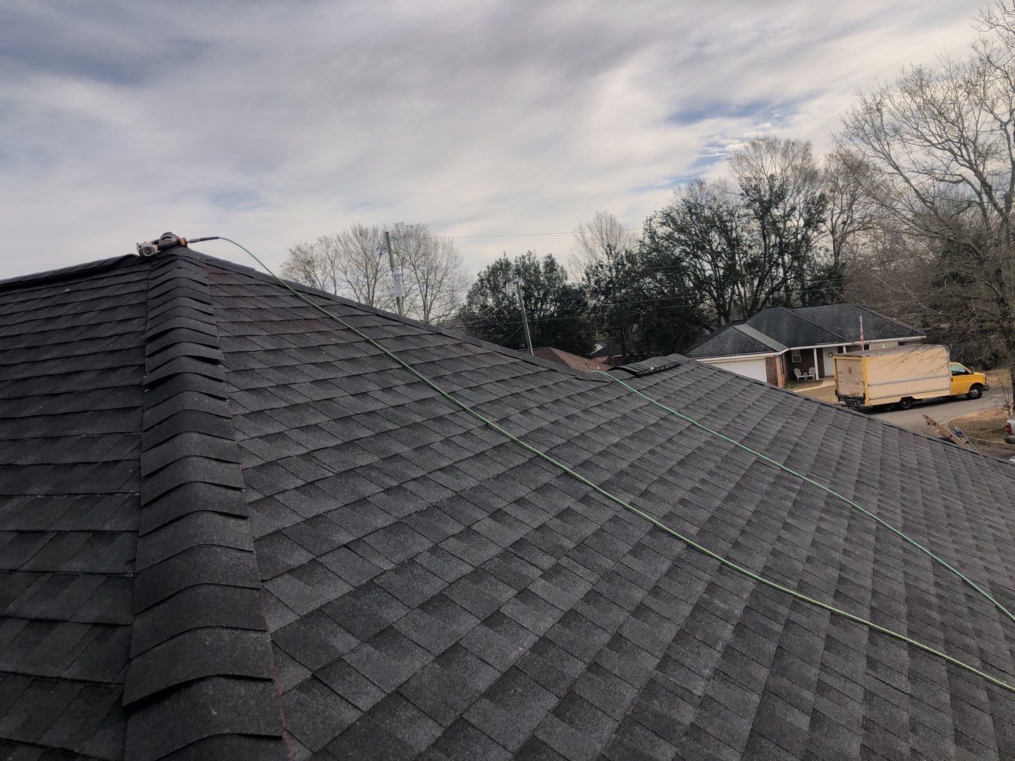 Residential Roofing Installation using Roof Replacement by American Roofing & Construction LLC