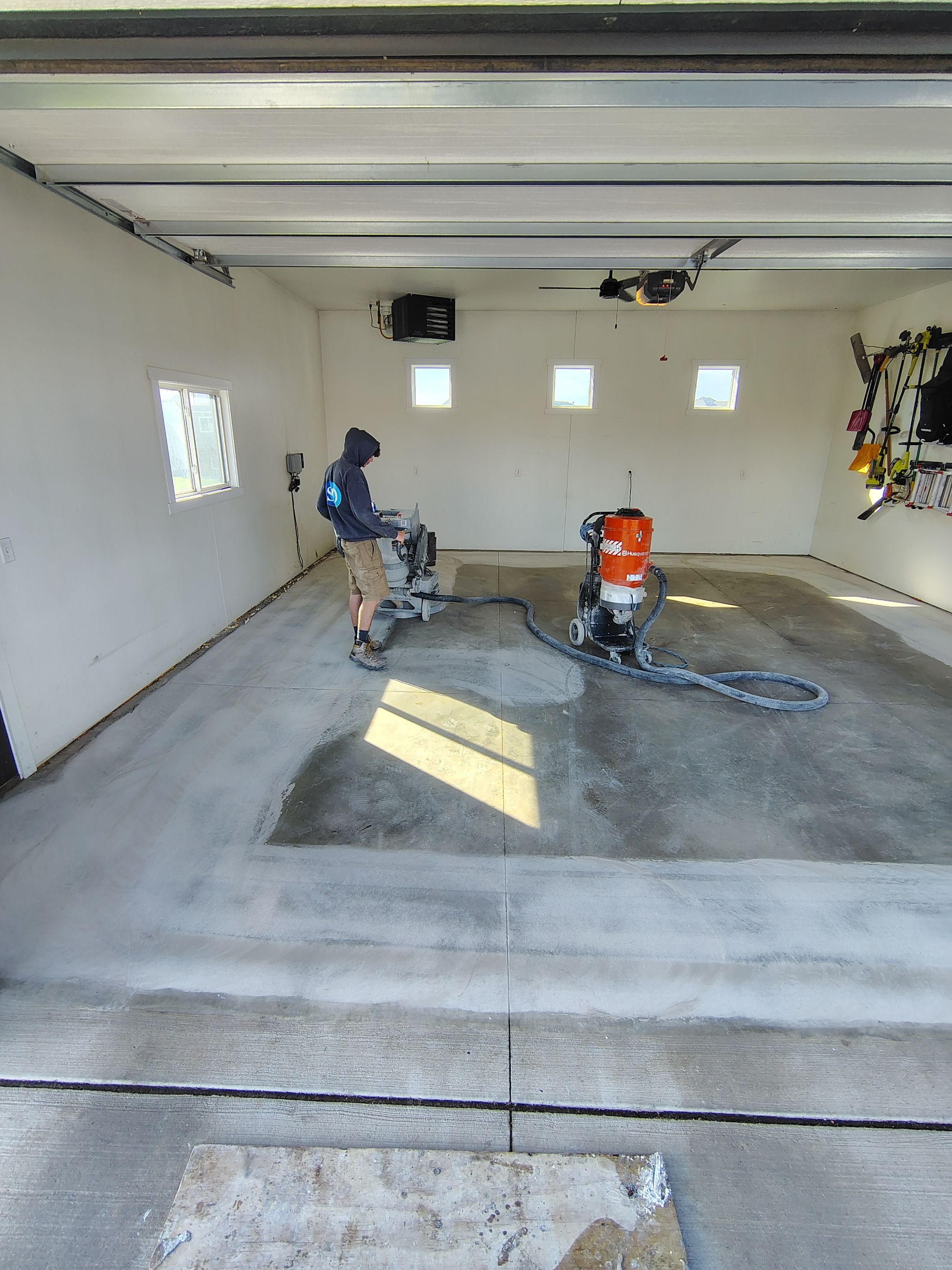 Dell Rapids Multi-Car Garage Concrete Floor Coating and Repair by Select Painting, Coatings & Garage Cabinets