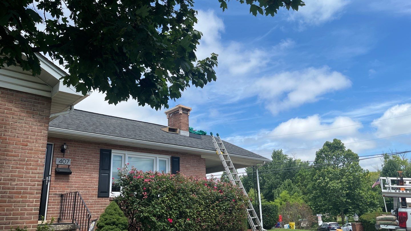 Residential Roofing Installation using Atlas Pinnacle Pristine Black Architectural Shingles by Frederick Roof Repair