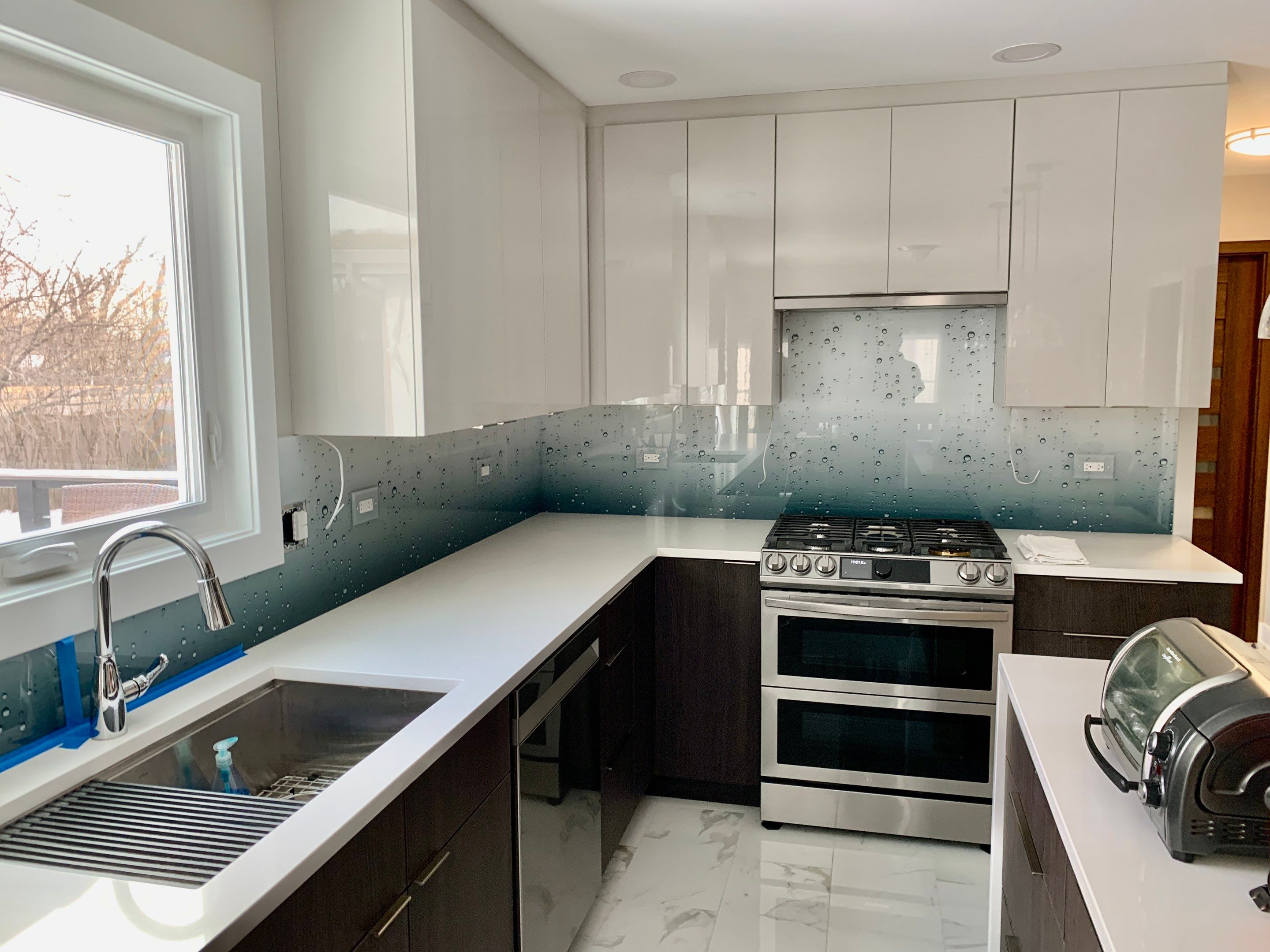 Let It Rain Kitchen Remodel using IMAGIO Solid Glass Backsplash by IMAGIO